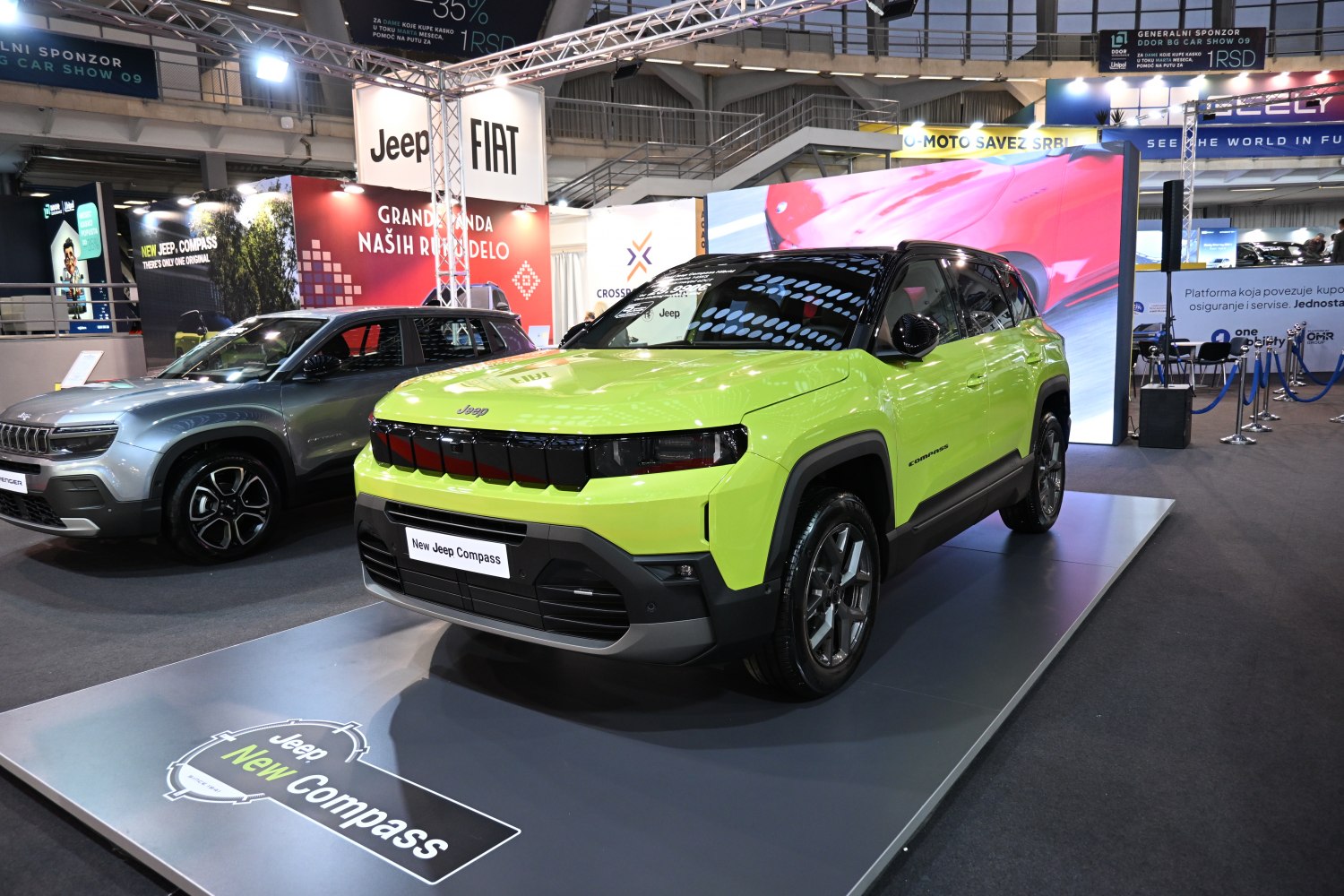 Futuristic front grille and sleek LED headlights on a neon green SUV