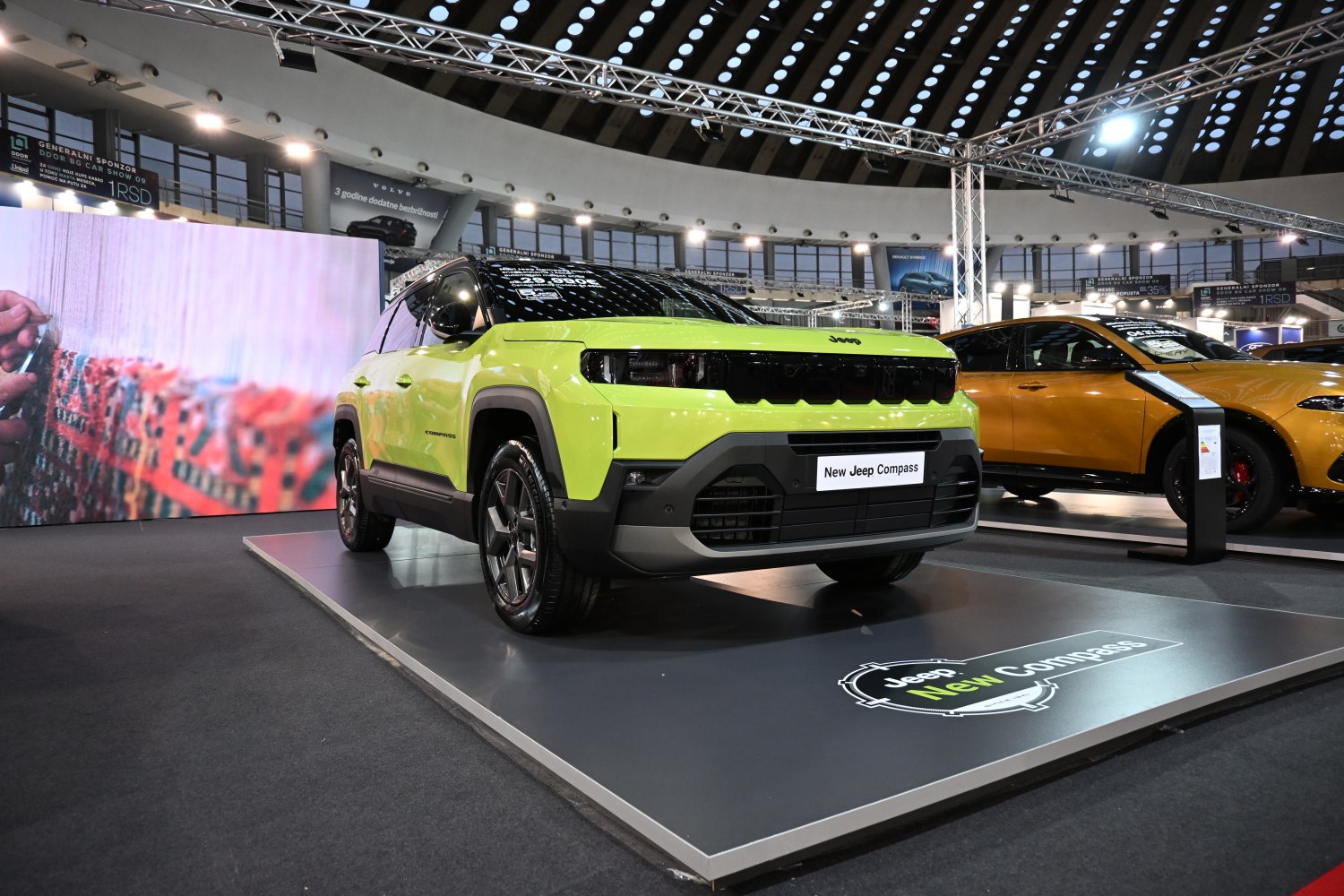 Bold black front grille and boxy rugged SUV design