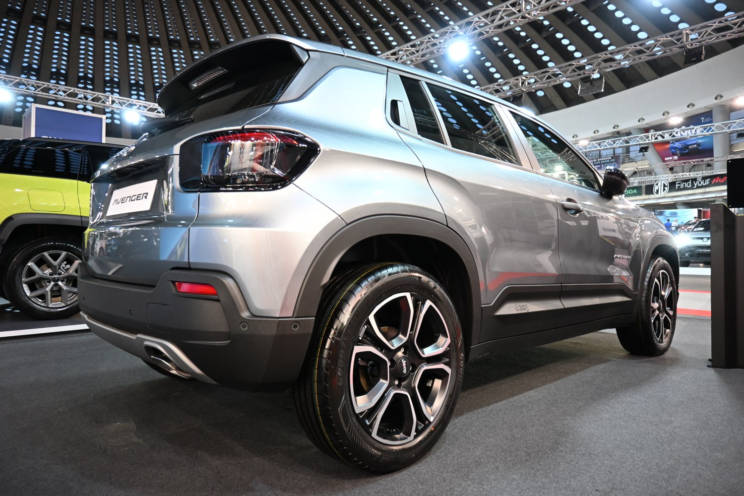 Rear side view of modern SUV with stylish alloy wheels and tail lights