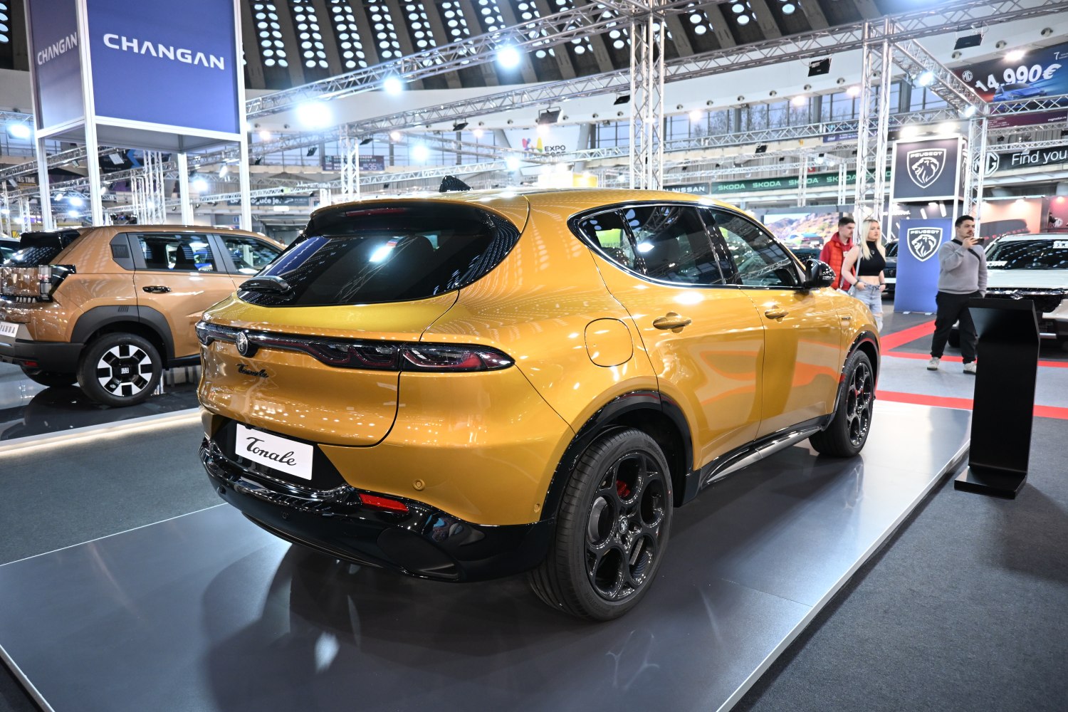 Rear view with distinctive taillights and sporty alloy wheels