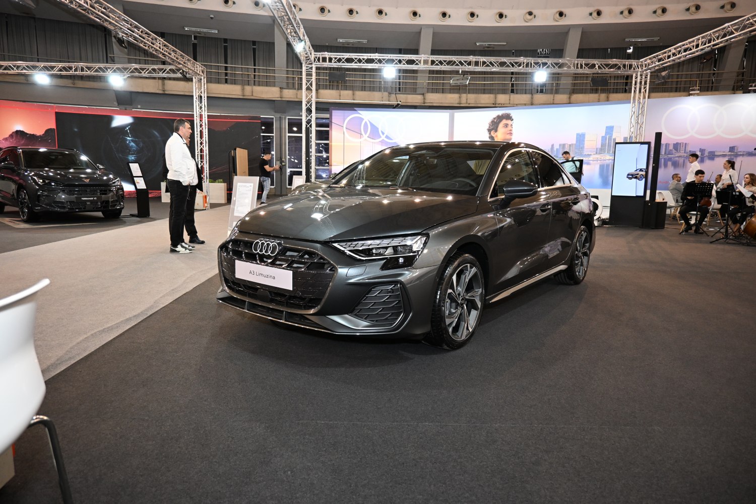 Front and side view of modern sedan with LED headlights and sleek design