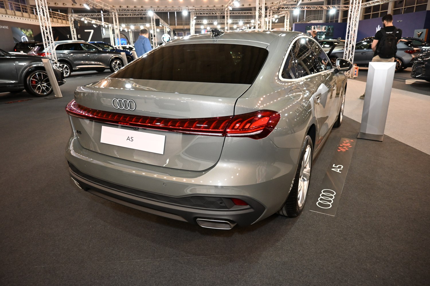 Rear view with full-width LED taillight and dual exhaust tip