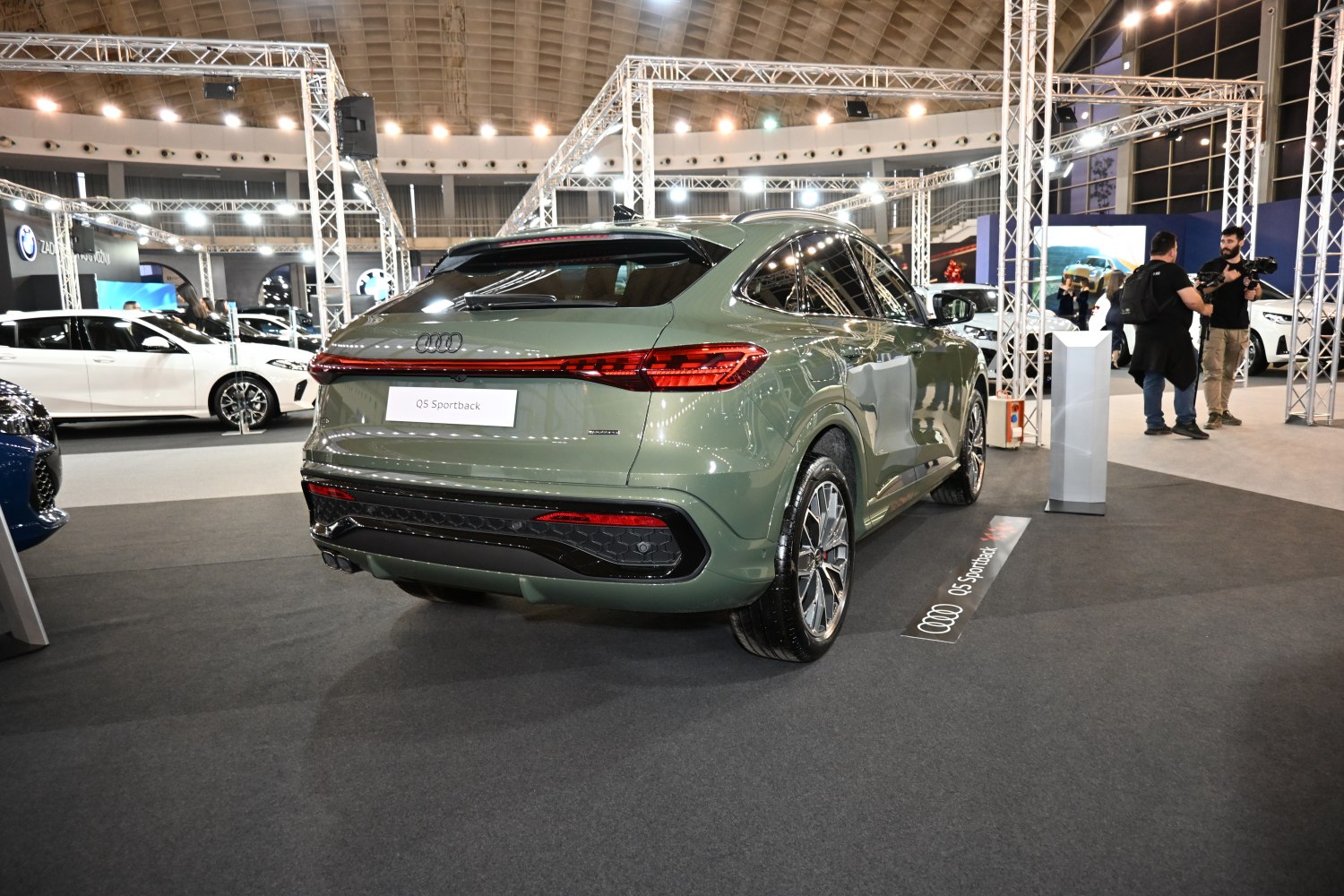 Sleek SUV rear with continuous LED tail light strip and sporty design