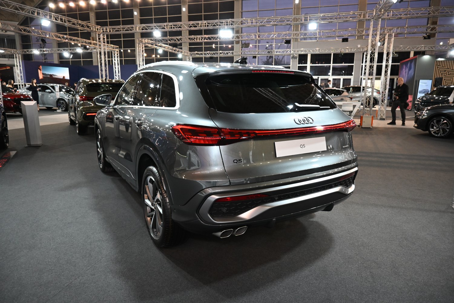 Rear view of SUV with LED tail lights and dual exhaust pipes