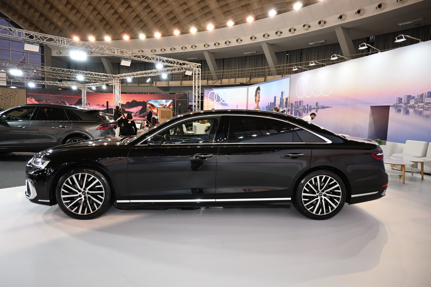 Luxury sedan with alloy wheels and extended wheelbase in black