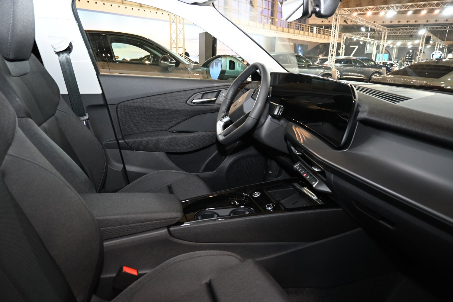Digital dashboard and sleek interior cabin with modern steering wheel and center console.