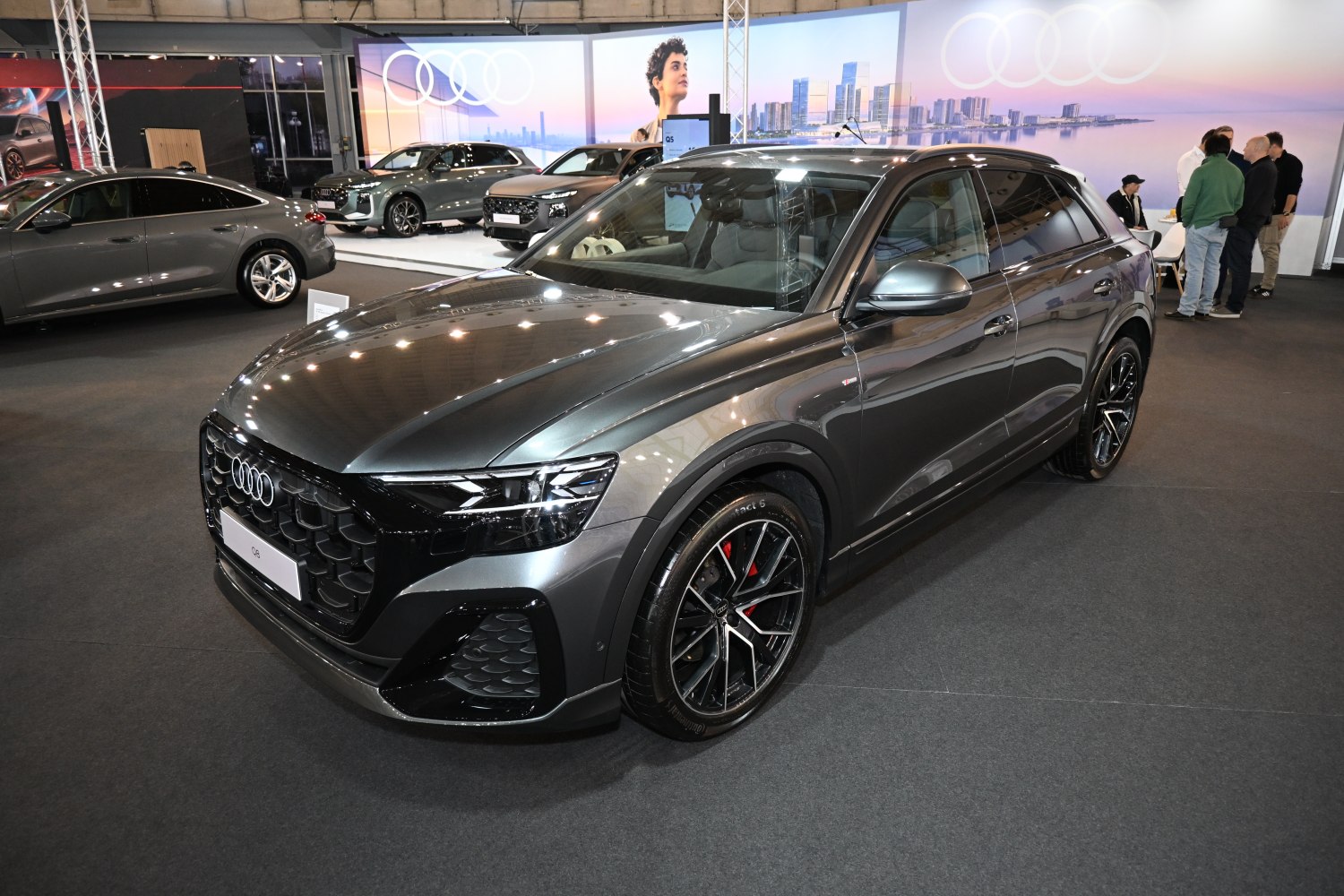 Aggressive front grille and sporty alloy wheels on a premium SUV