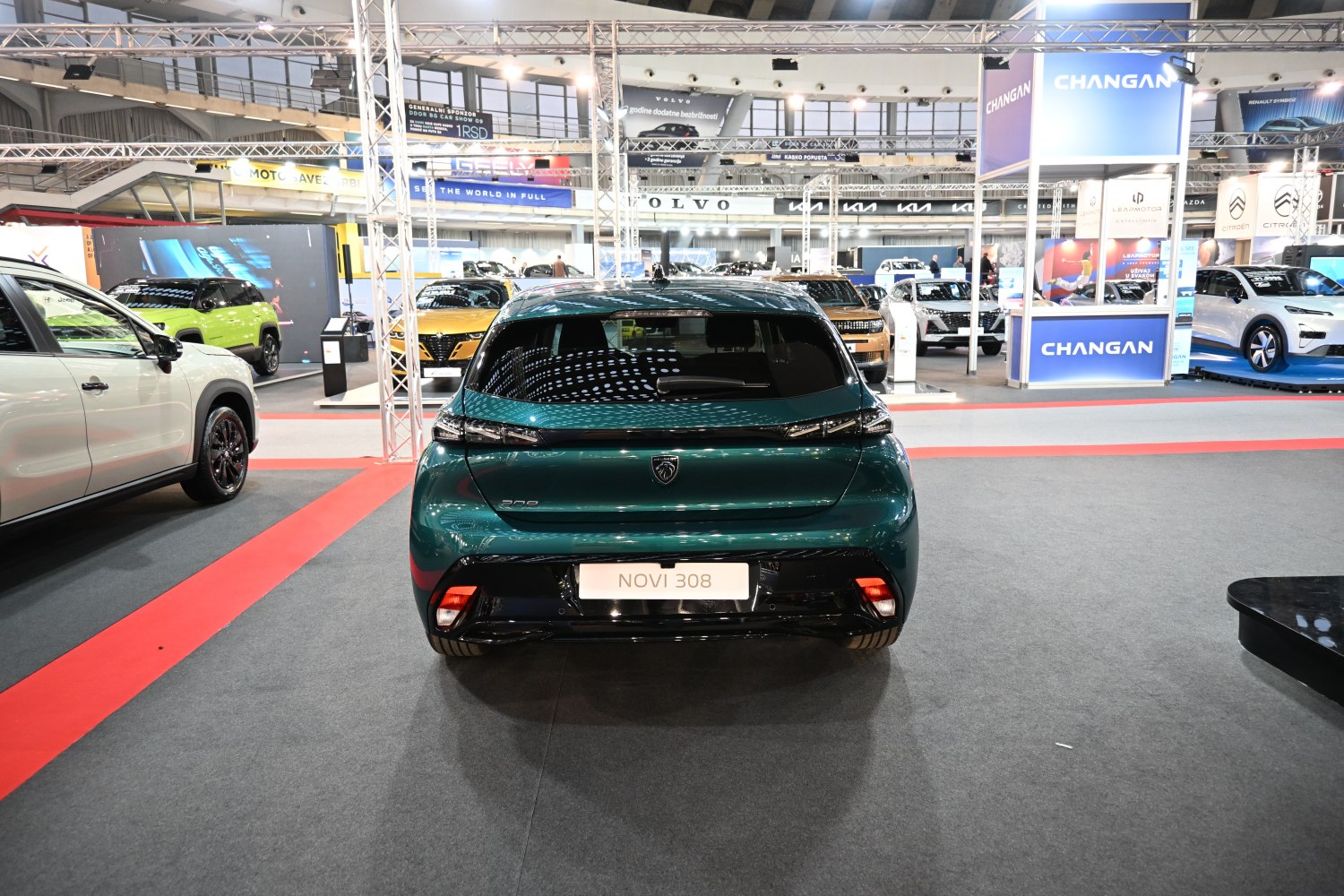 Rear view of a modern compact hatchback with distinctive taillights and sporty bumper.