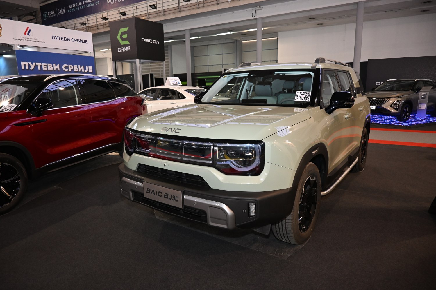 Front LED headlights and rugged SUV exterior with side steps
