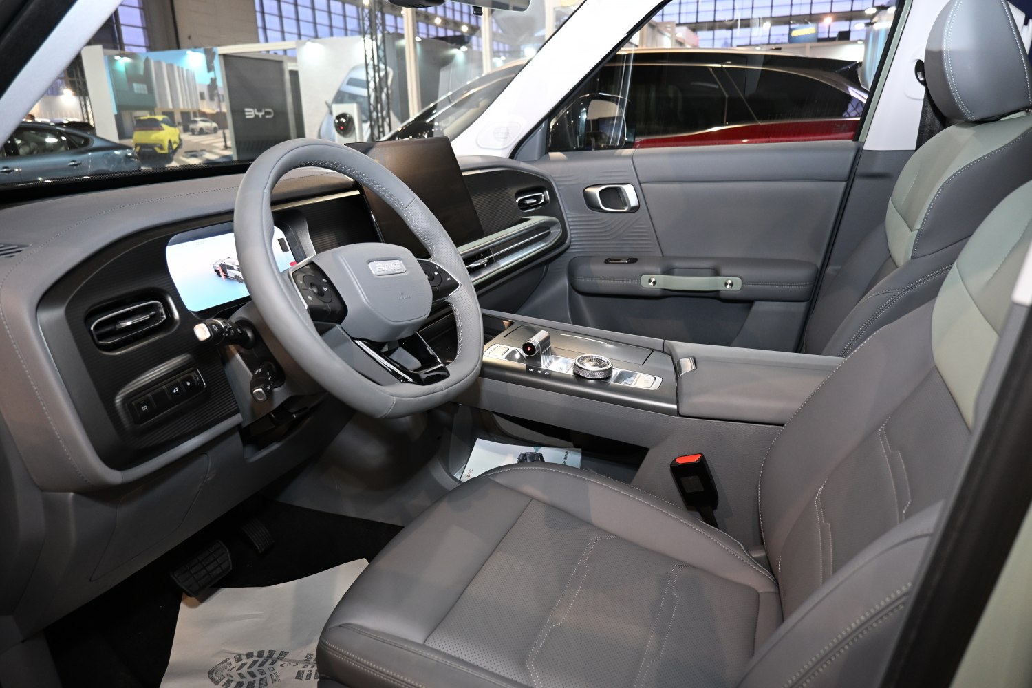 Modern SUV interior with digital dashboard and multifunction steering wheel