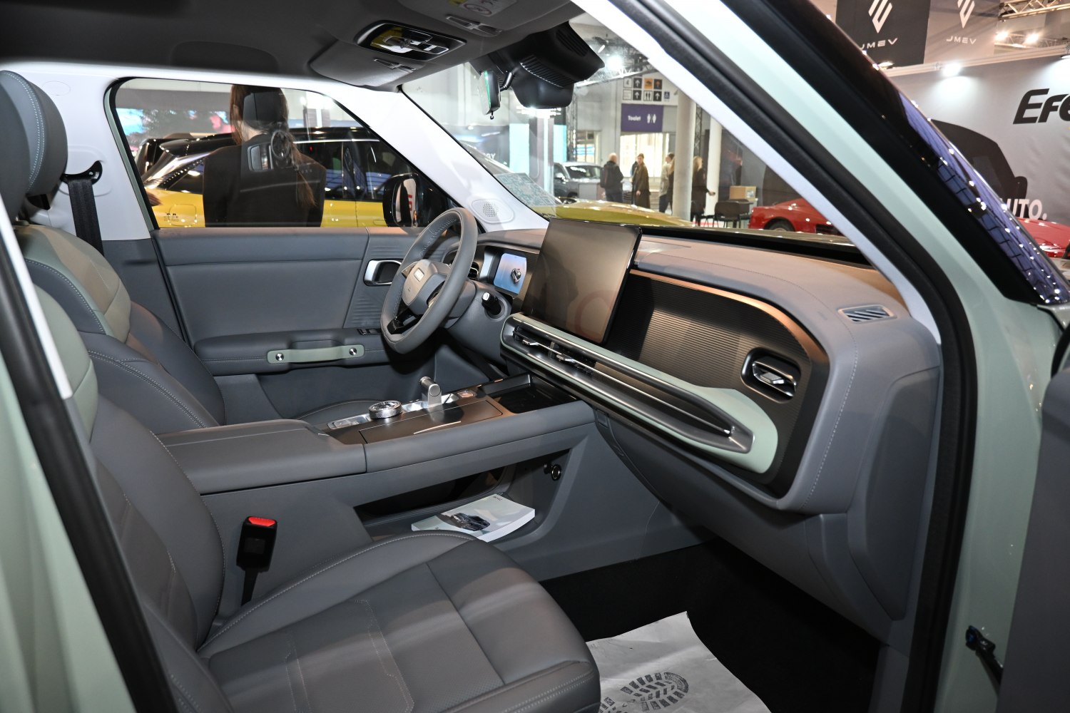 Modern interior with digital dashboard and leather front seats