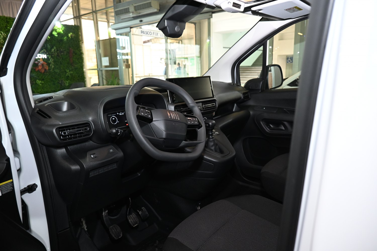 Fiat Doblo III 2022 interior with steering wheel and digital dashboard