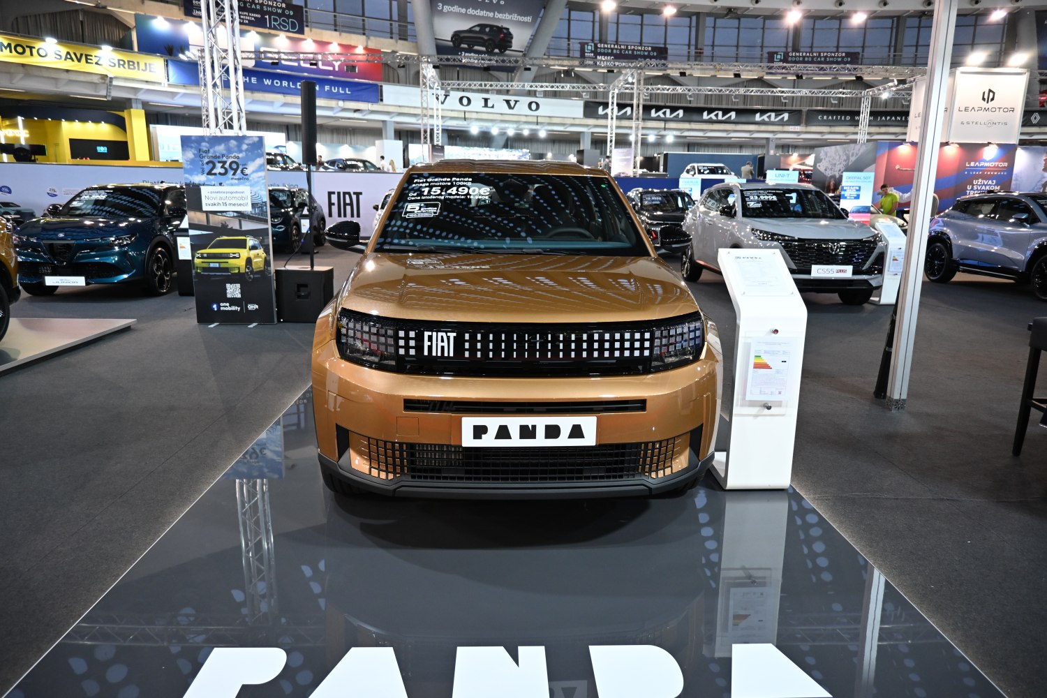 Front view of a compact vehicle with distinctive LED grille and bold design.