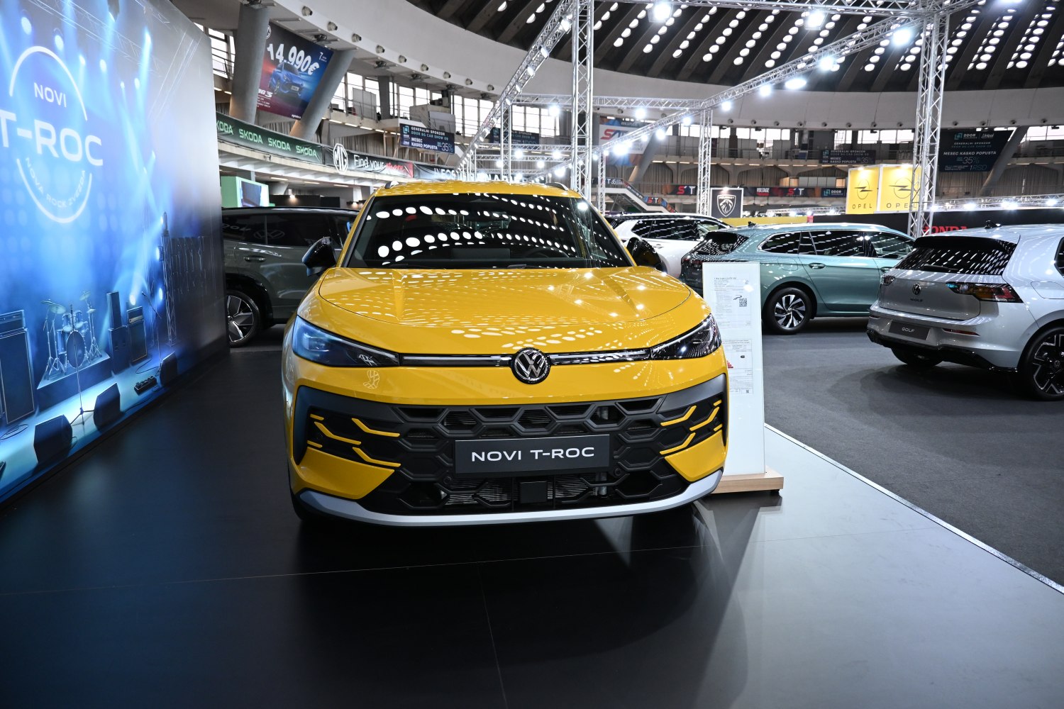 Front view with honeycomb grille and sleek headlights in yellow