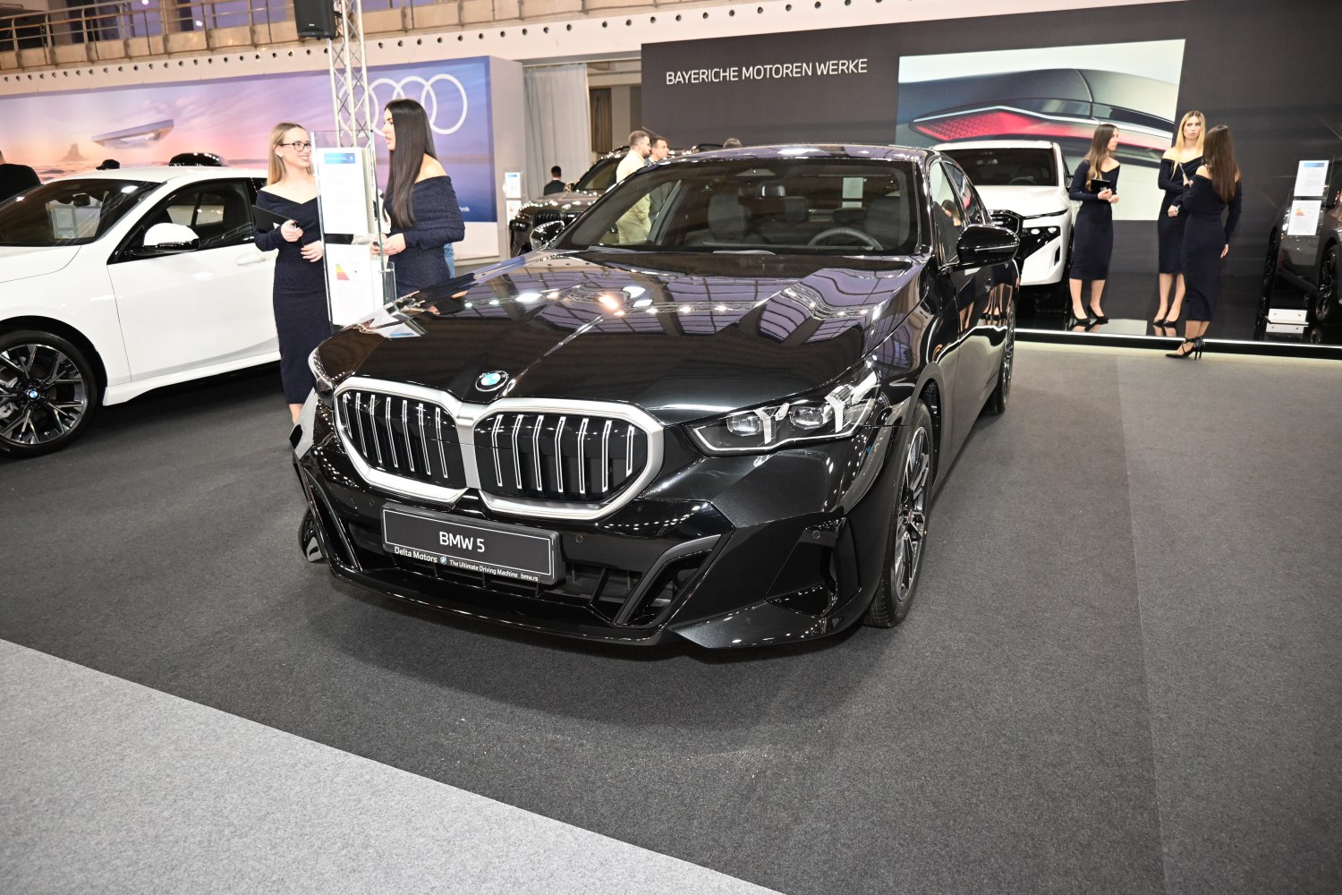 Front grille and LED headlights of a luxury sedan