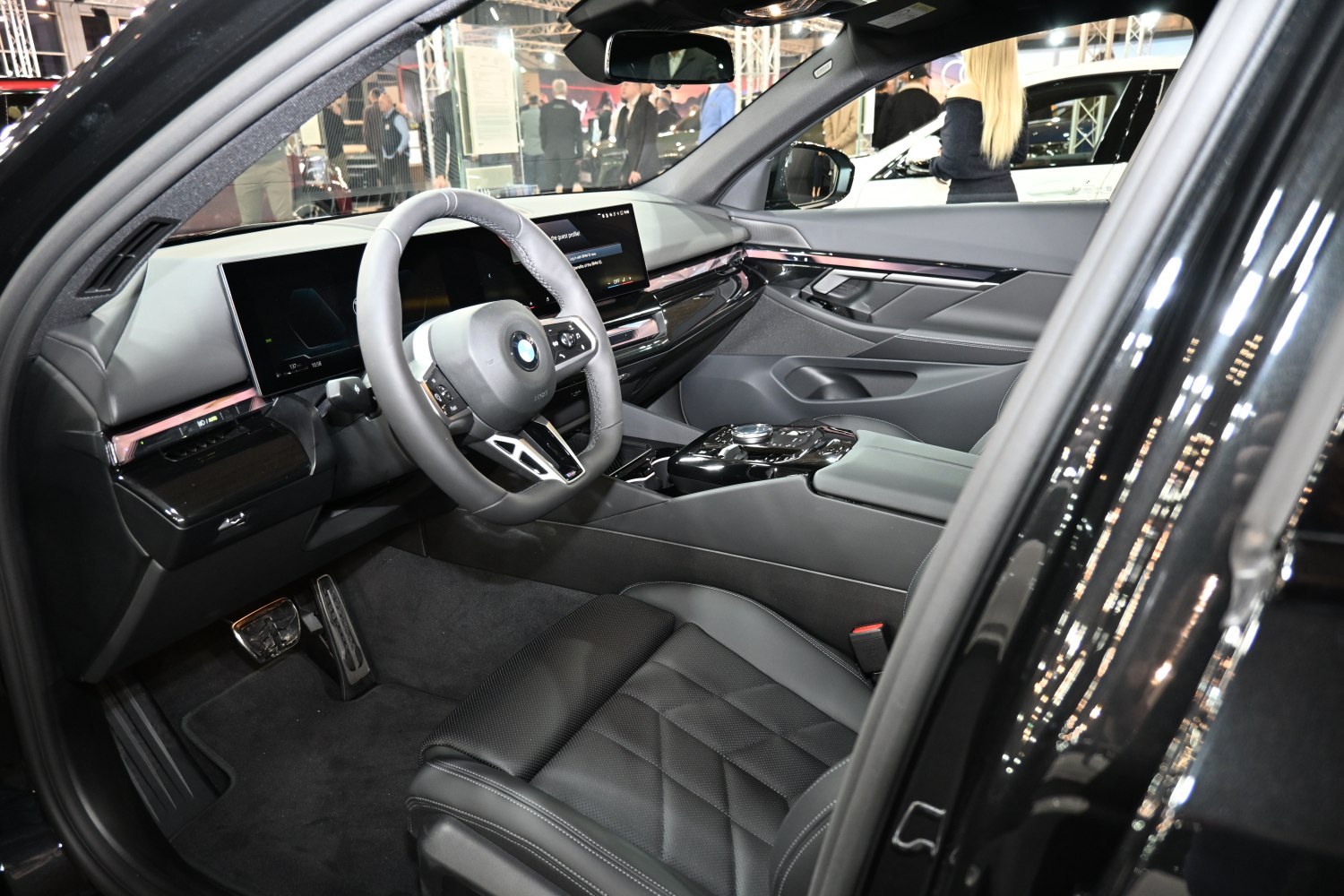 Modern luxury interior with digital displays and premium leather upholstery