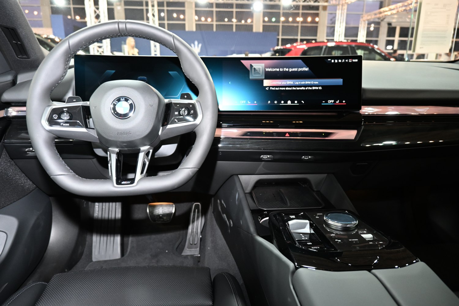 Digital dashboard and multifunction steering wheel inside a modern car interior