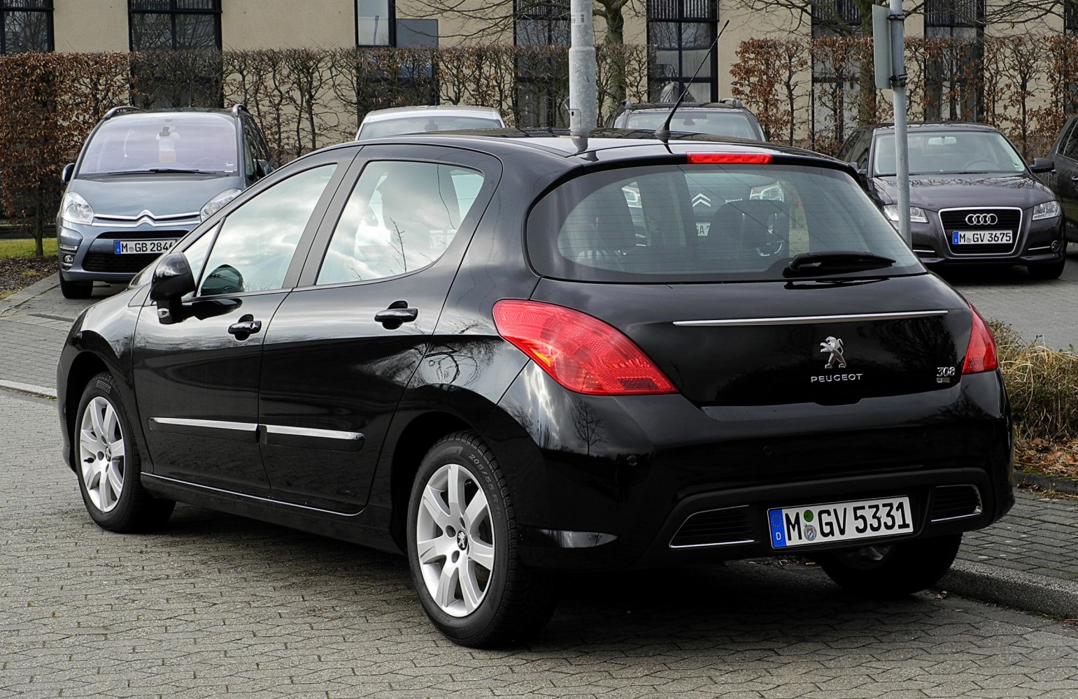 Rear view of hatchback with distinctive tail lights and rear design
