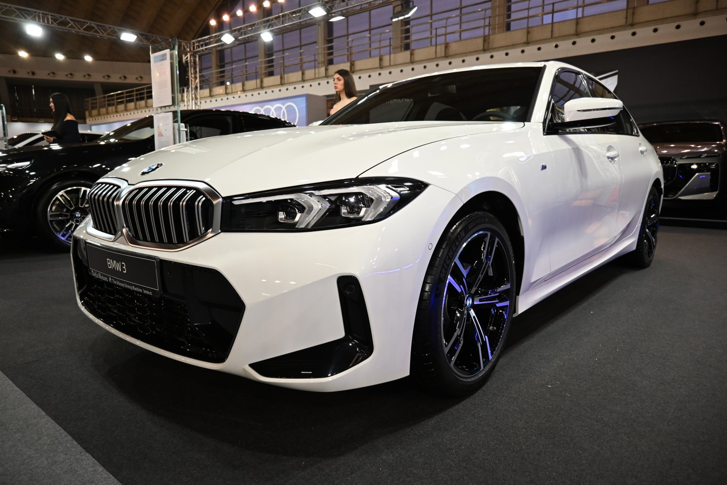 Front close-up of BMW 3 Series with kidney grille and LED headlights
