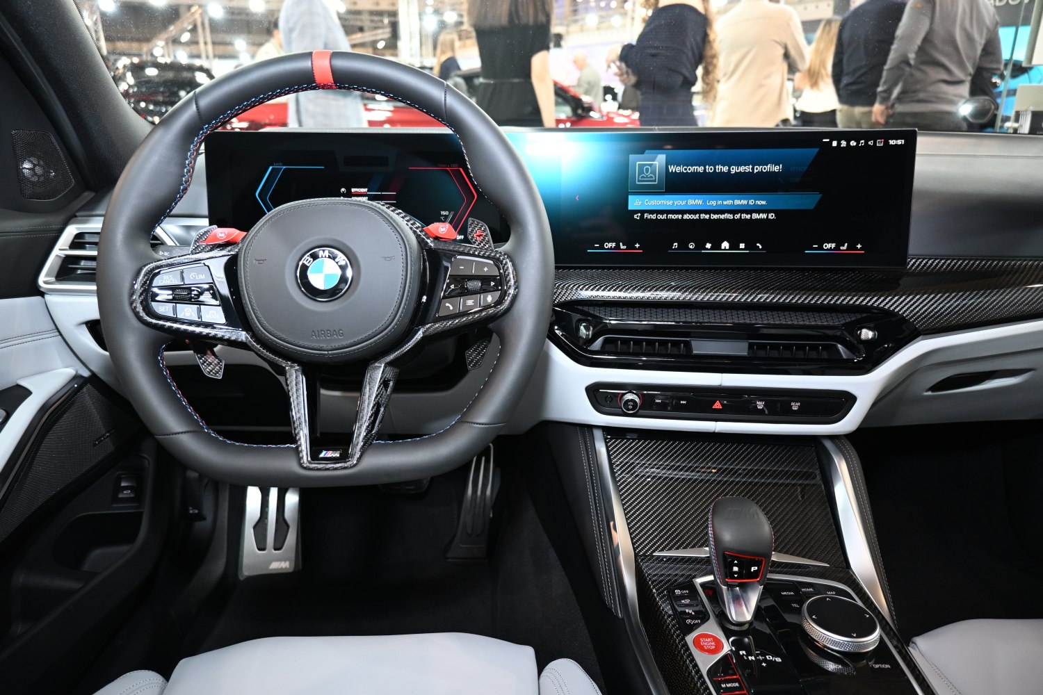 Sport steering wheel and digital dashboard with carbon fiber details