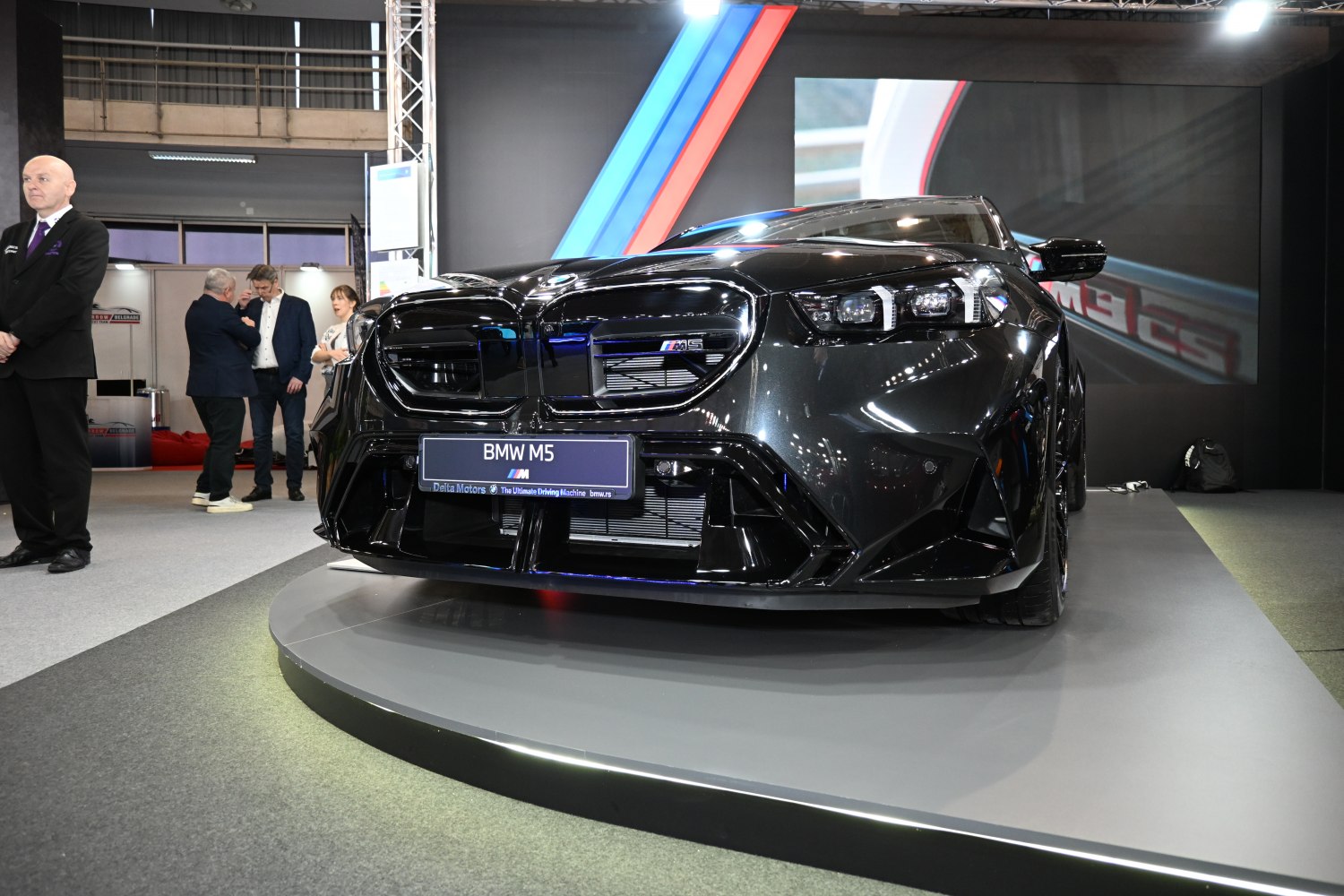 Front grille and LED headlights of a sporty luxury sedan