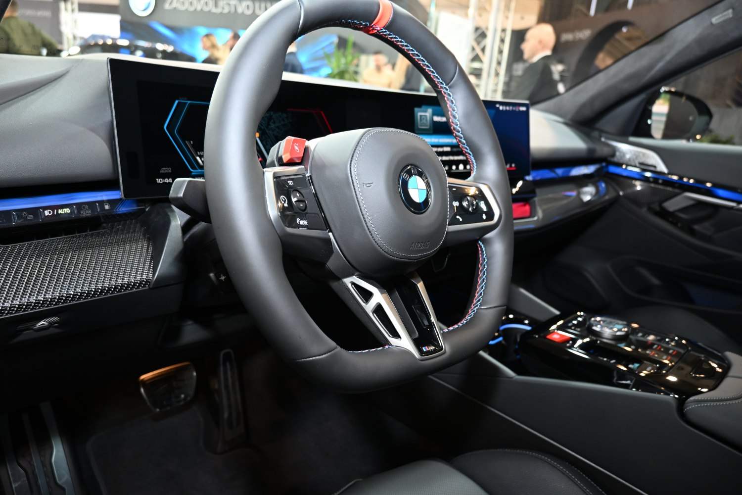 Sport steering wheel with colored stitching and large dual digital displays