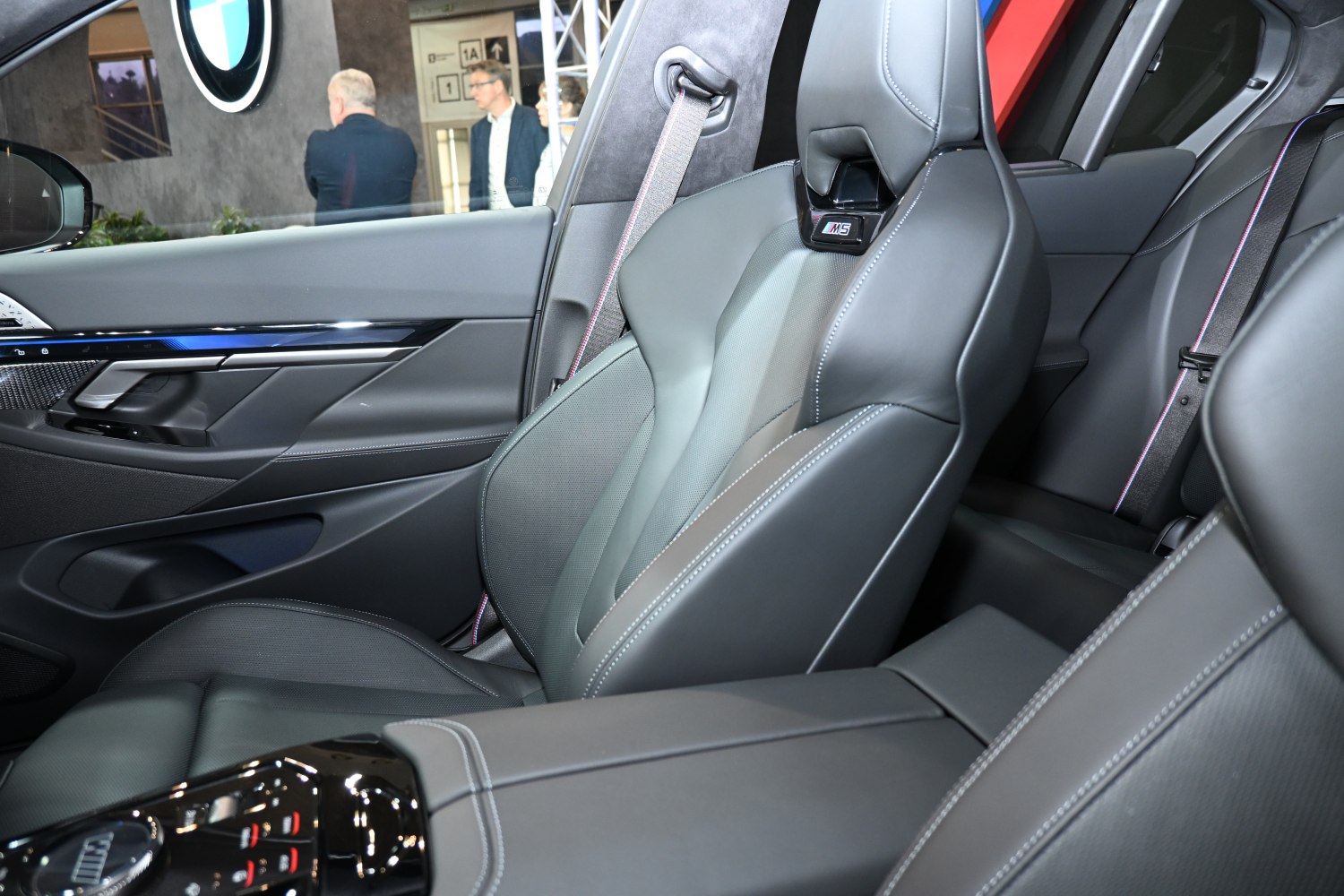 Luxurious ergonomic driver seat with M5 emblem and premium leather.