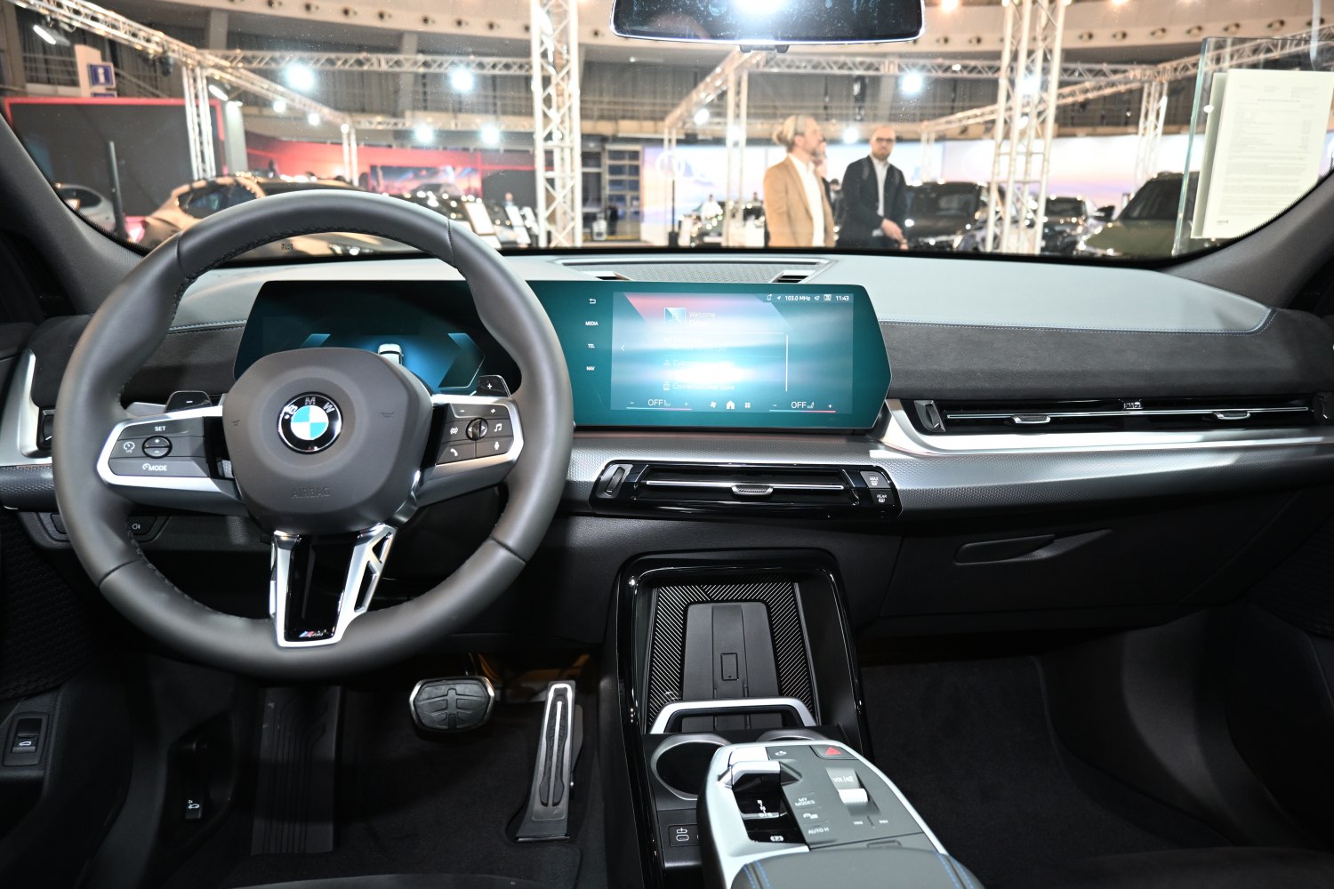 Digital instrument cluster and large infotainment display with modern steering wheel controls