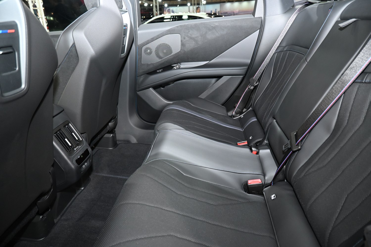 Rear passenger seating and door panel interior with luxury design