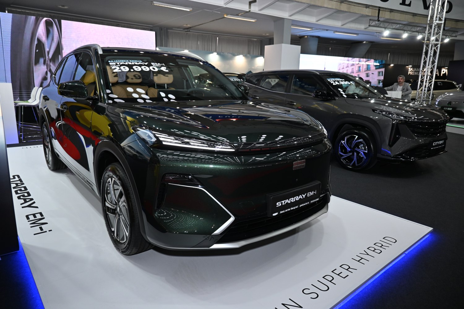 Aerodynamic hybrid SUV with slim LED headlights and futuristic front design