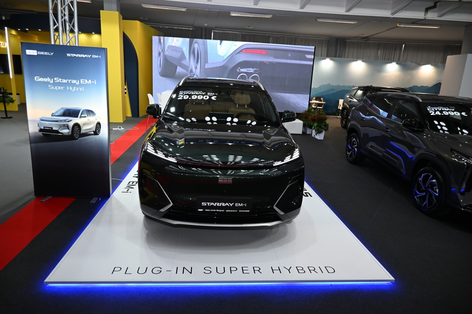 Front view of a sleek black plug-in super hybrid SUV with modern LED lights.