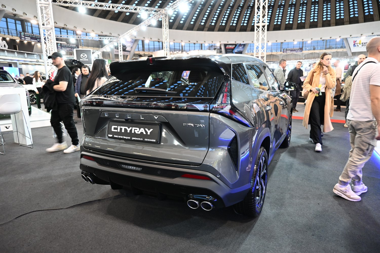 Rear view of a modern SUV with quad exhaust and distinct taillights