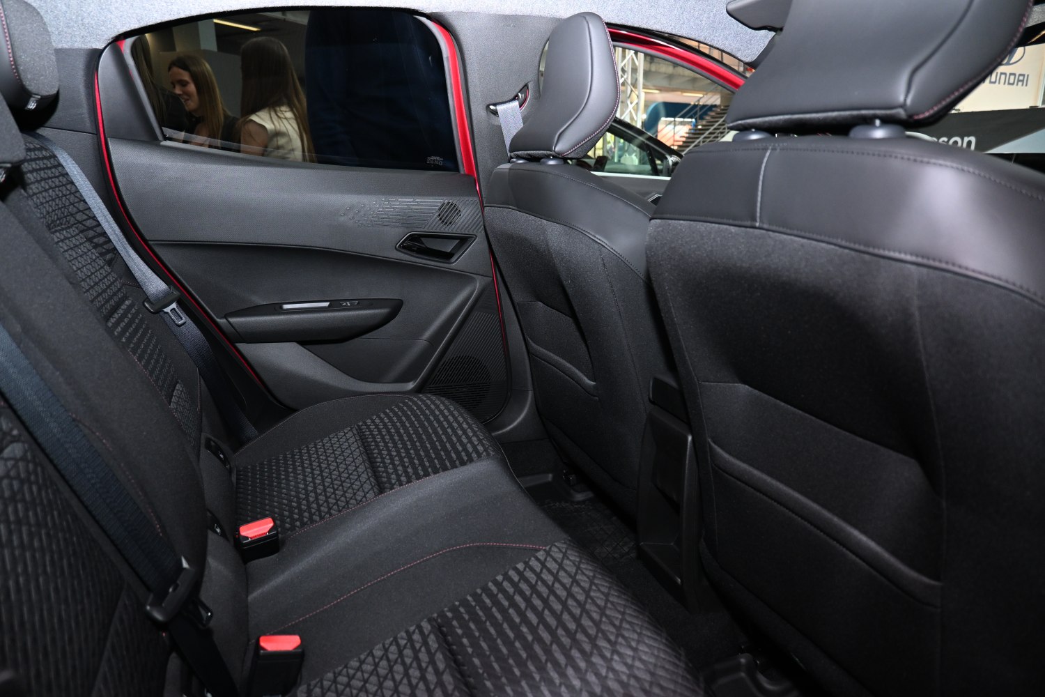 Modern rear seat interior with fabric upholstery and ergonomic design