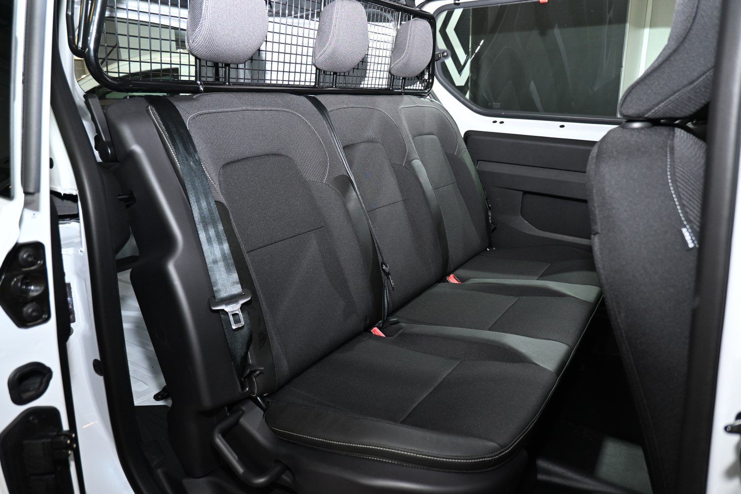 Spacious rear seat interior with three seats and headrests