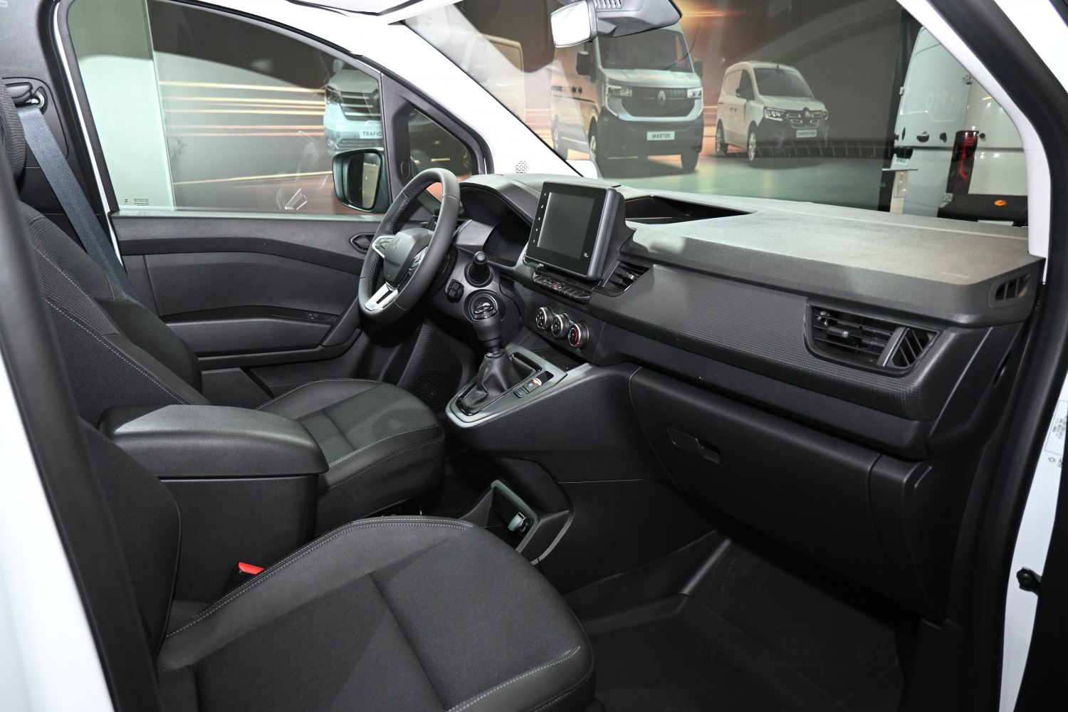 Dashboard with touchscreen and ergonomic front seats