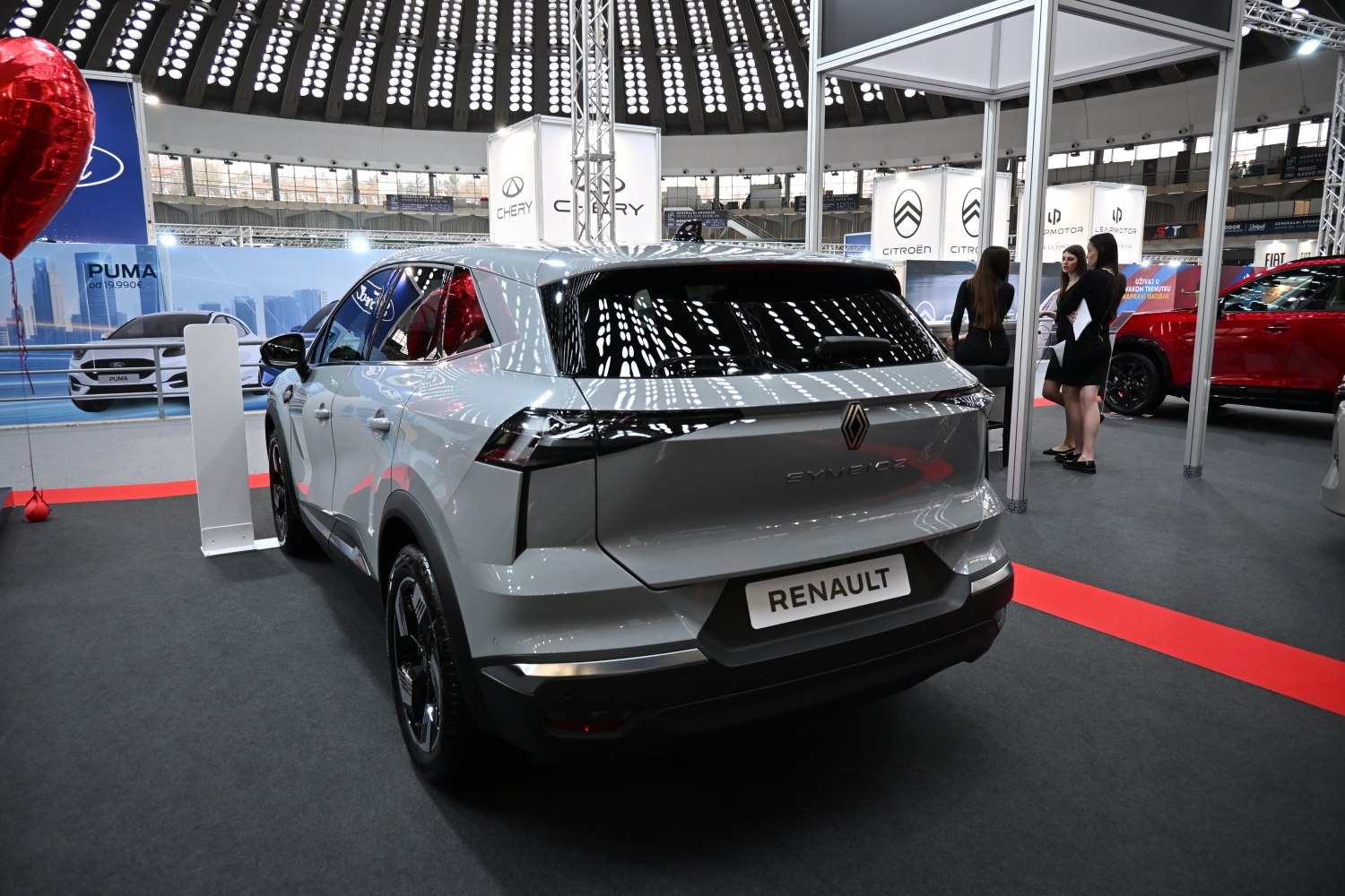 Rear view of futuristic electric SUV with sleek tail lights