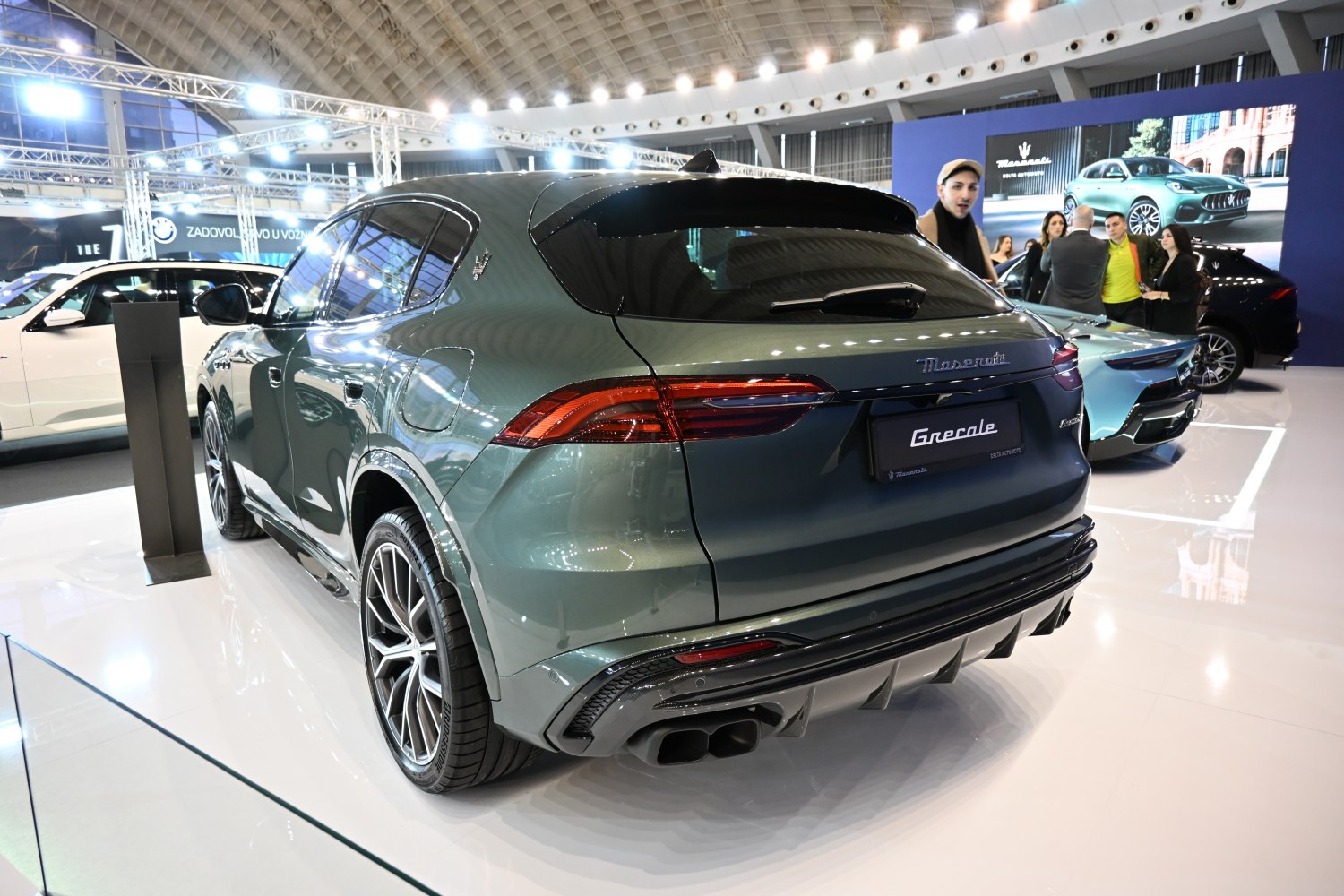 Rear view of an SUV with LED taillights and dual exhausts.