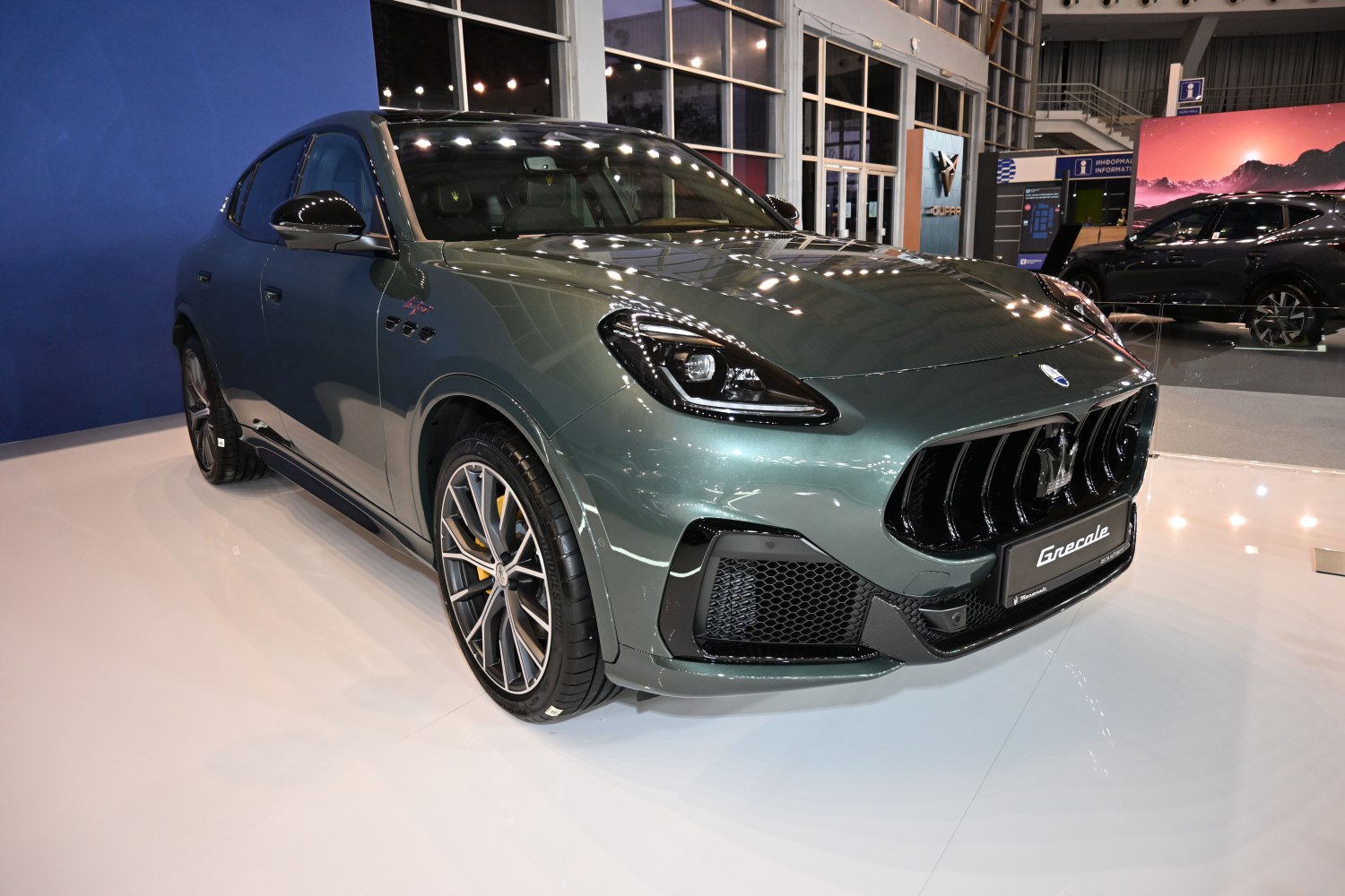 Front view of a luxury SUV with distinctive grille and LED headlights
