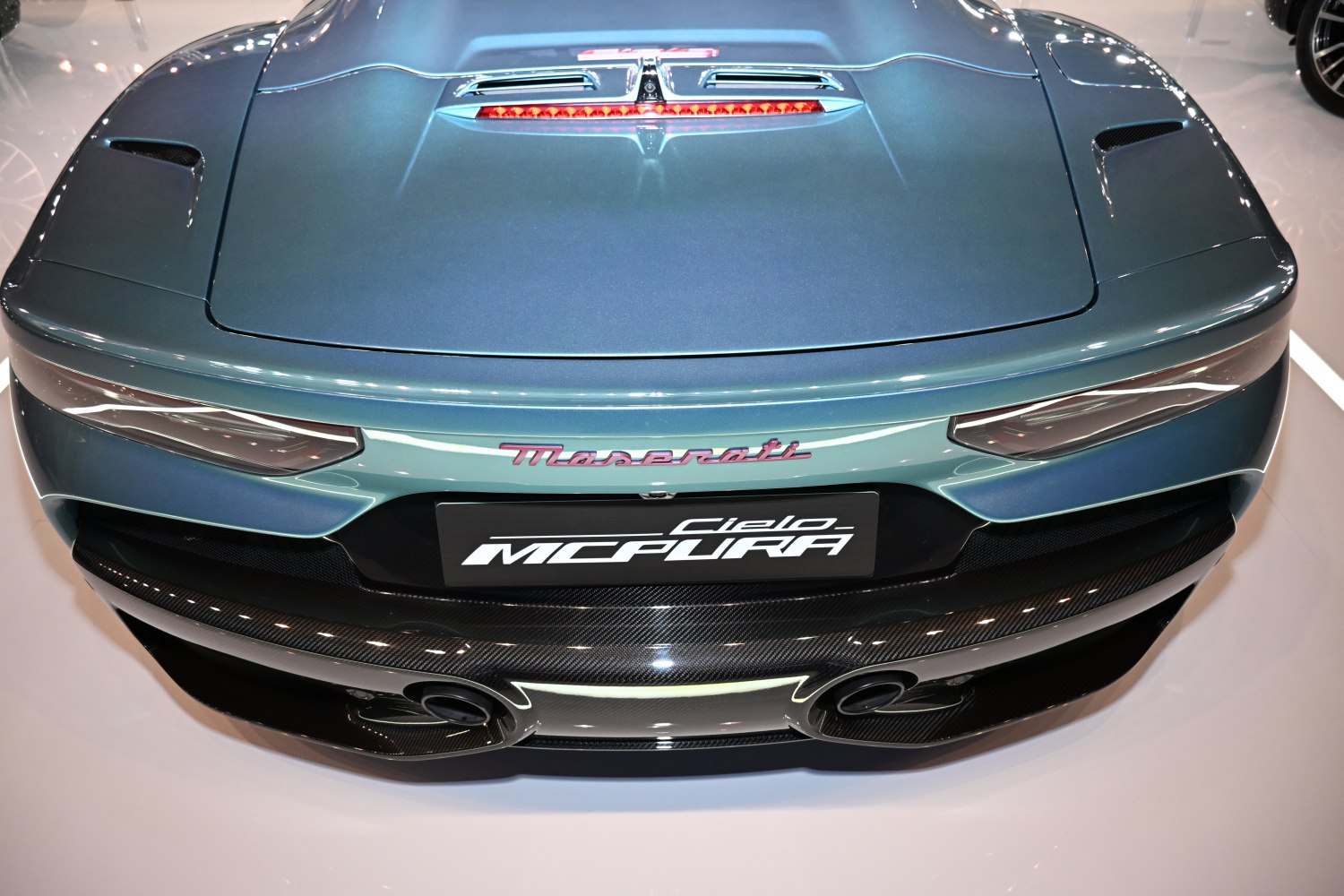 Close-up of MCPURA Cielo rear tail lights and exhaust pipes