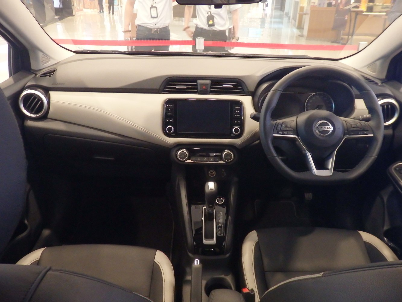 Interior dashboard and steering wheel with touchscreen and controls