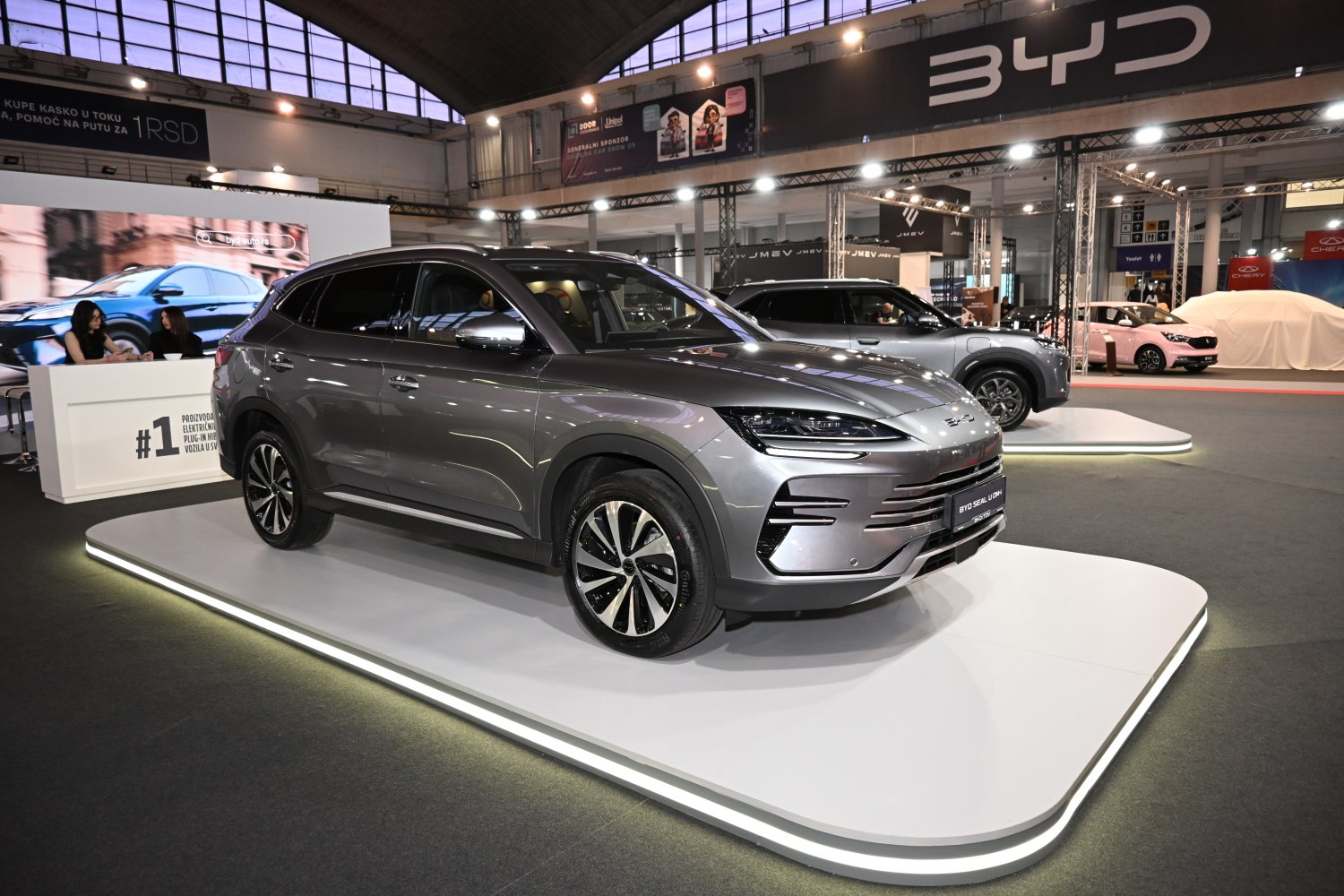 Modern electric SUV with aerodynamic body and LED headlights