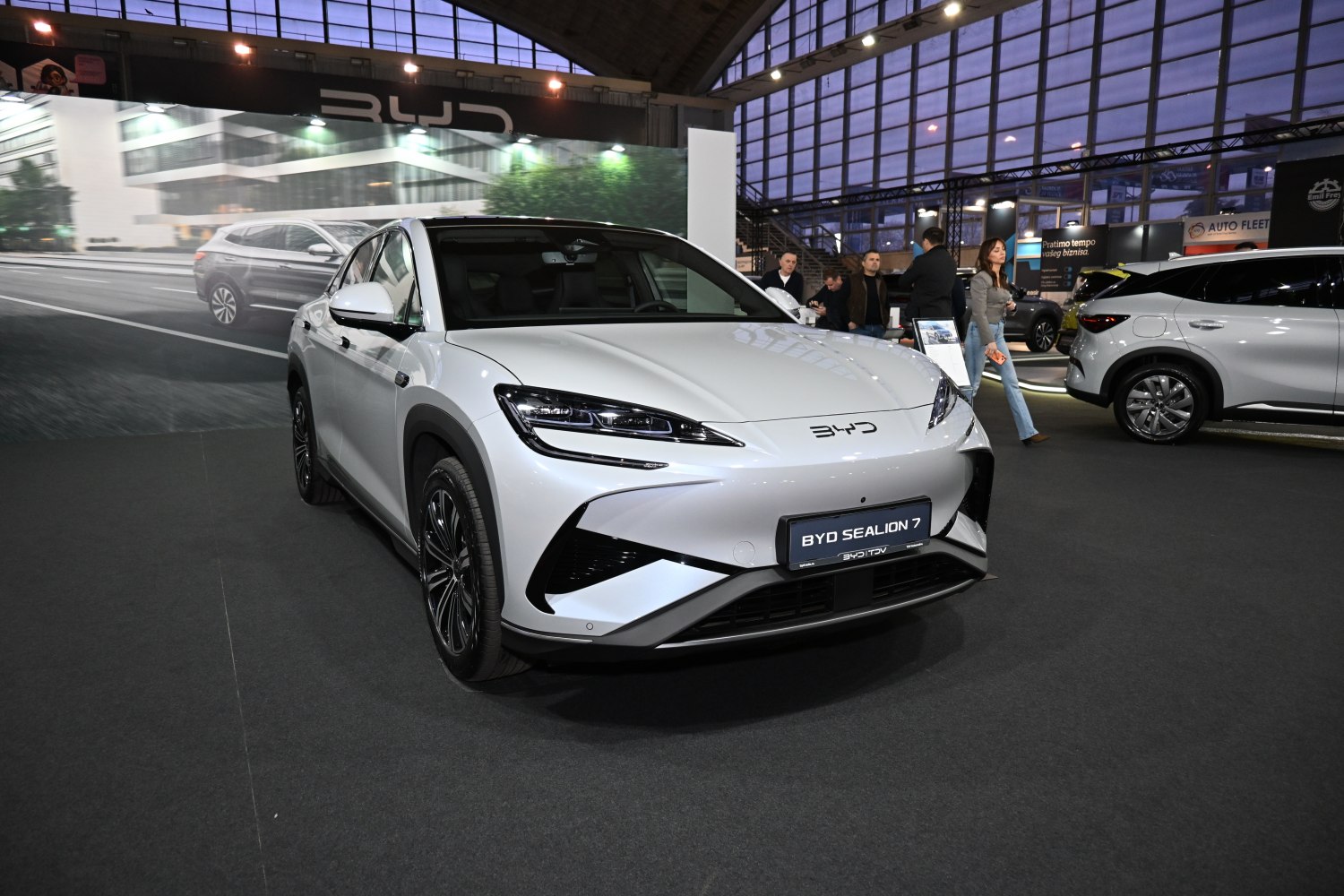 Aerodynamic front design with sharp LED headlights of an electric SUV