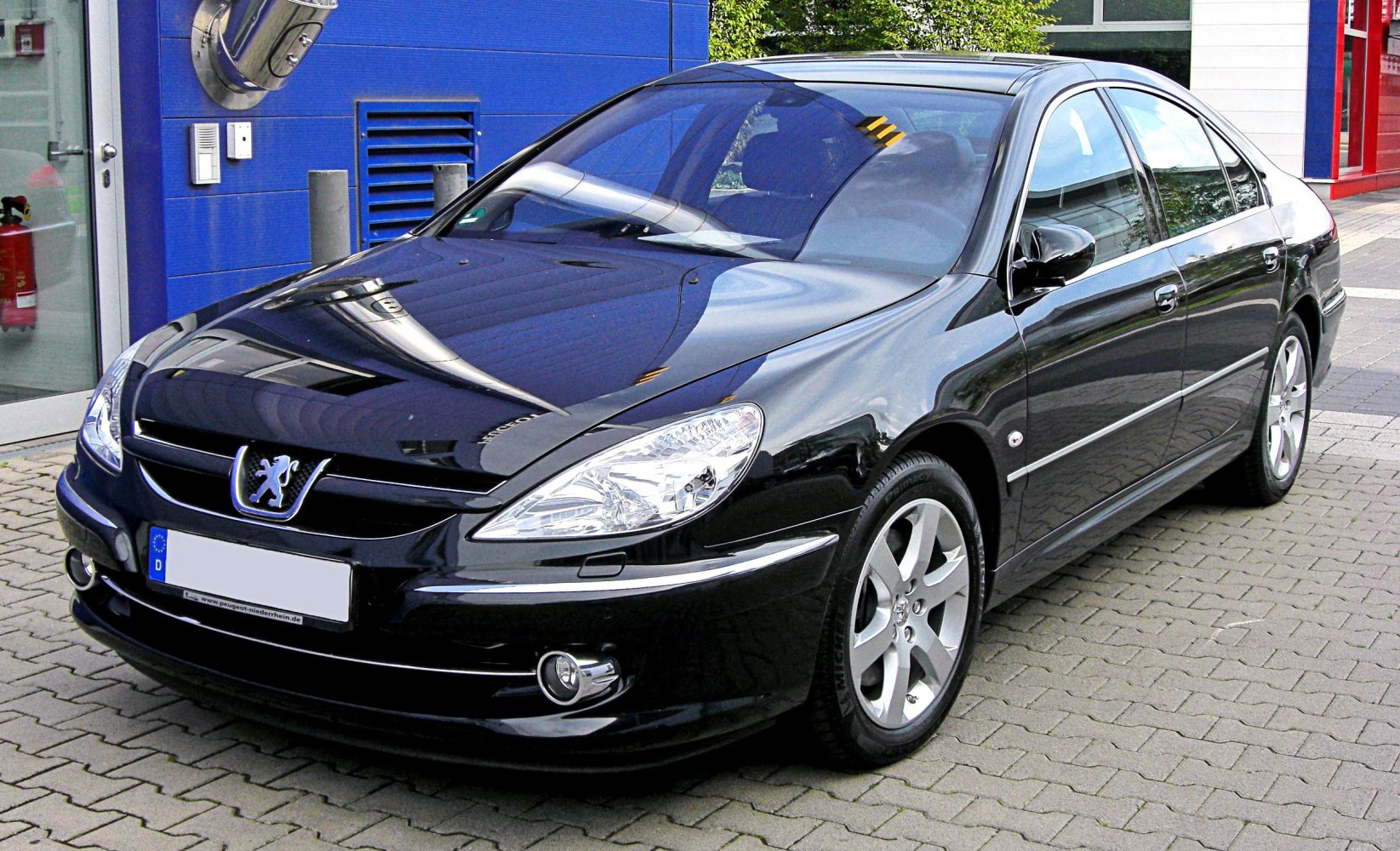 Front side view with headlights and alloy wheels
