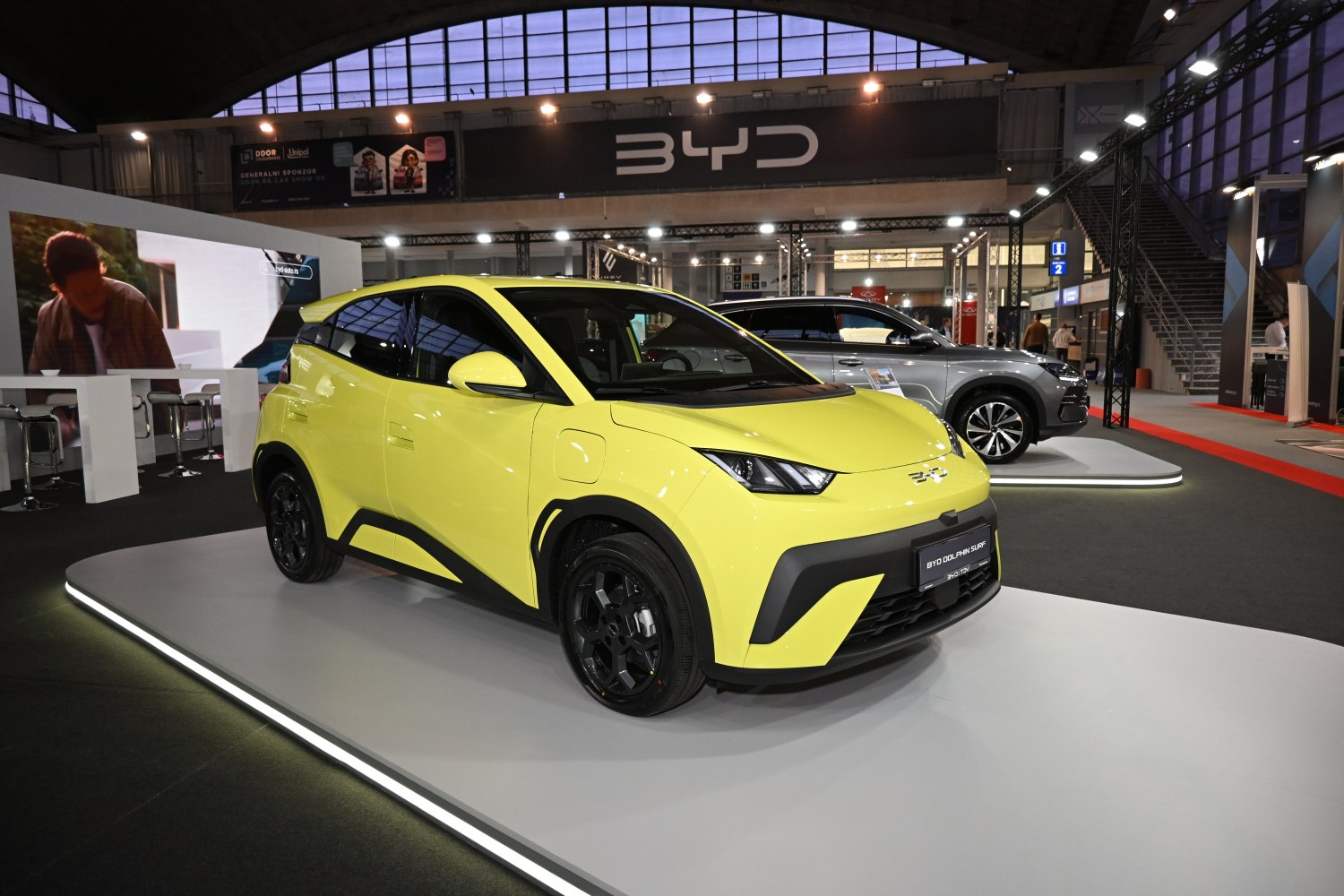 Yellow electric subcompact hatchback with modern styling