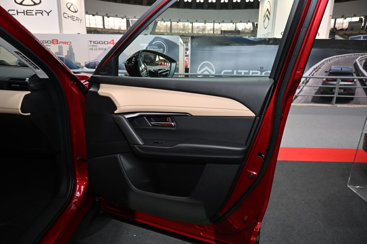 Two-tone interior car door panel with sleek design