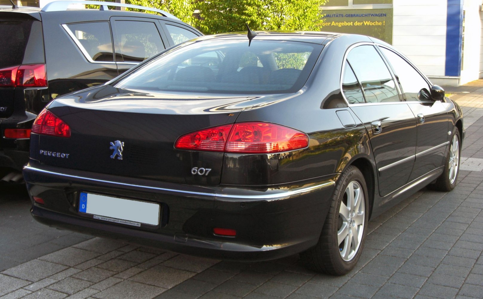 Rear and side profile with distinct tail lights and smooth body lines