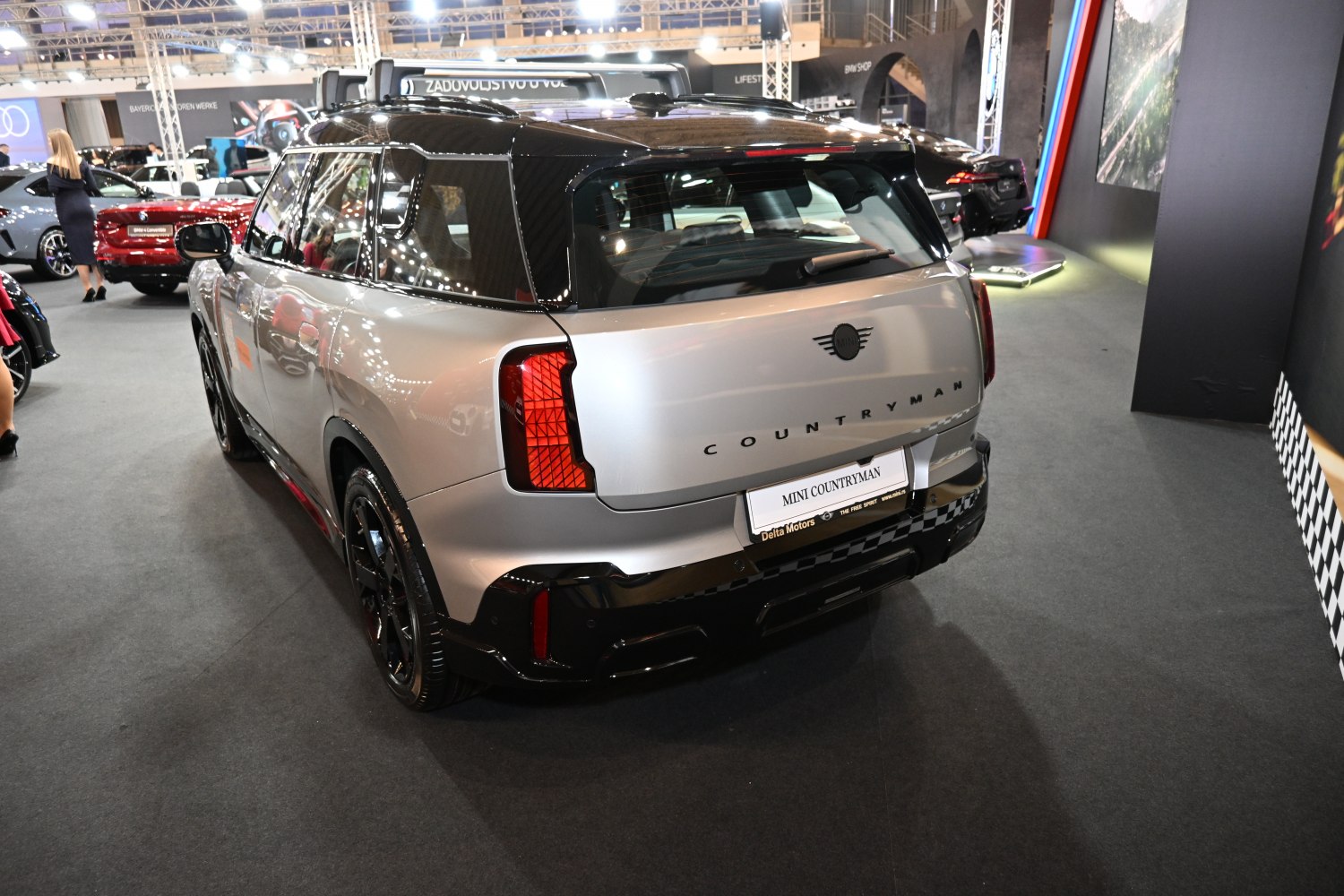 Rear view of compact SUV with distinctive tail lights and black roof