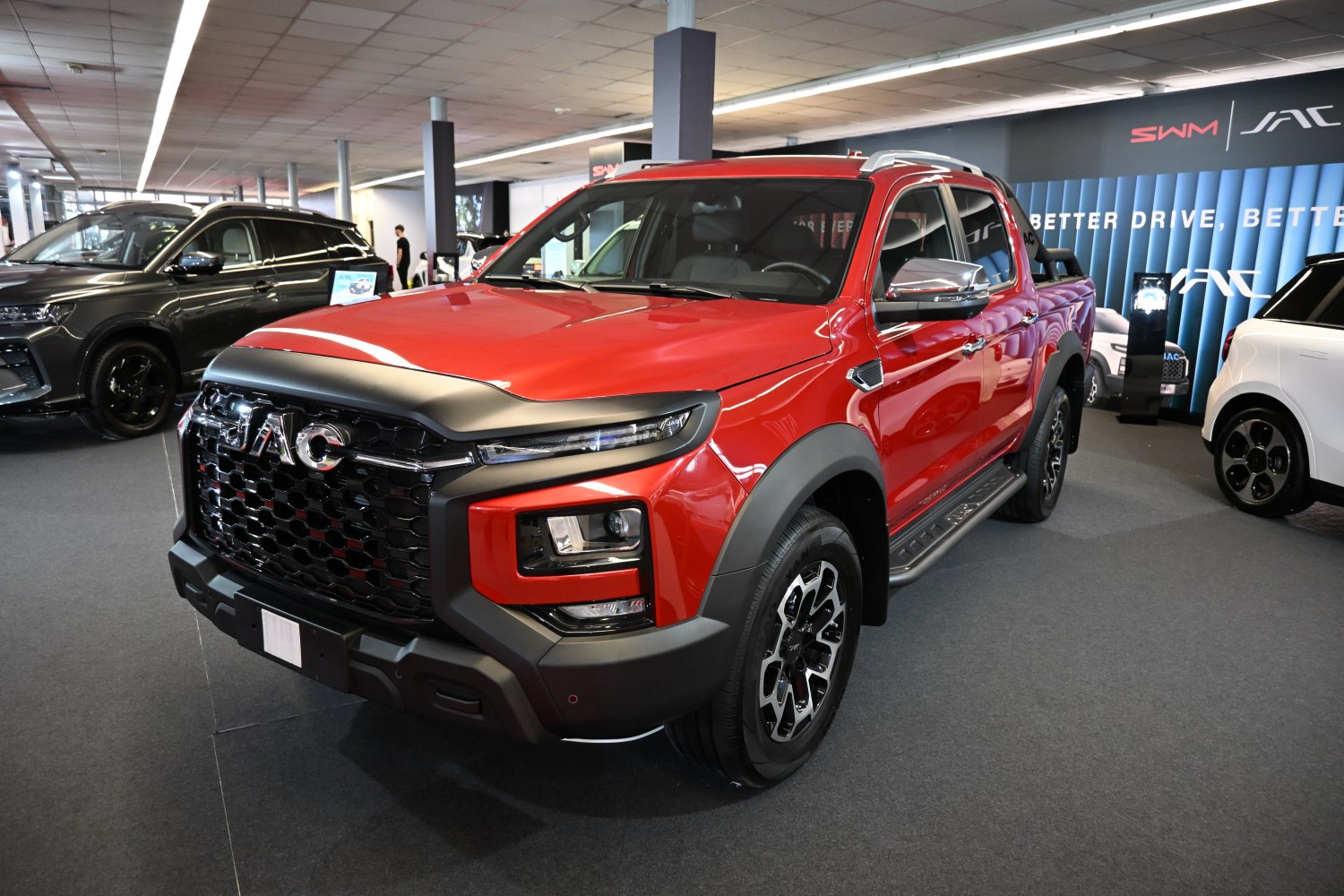 Double cab pickup with bold black mesh grille and LED headlights