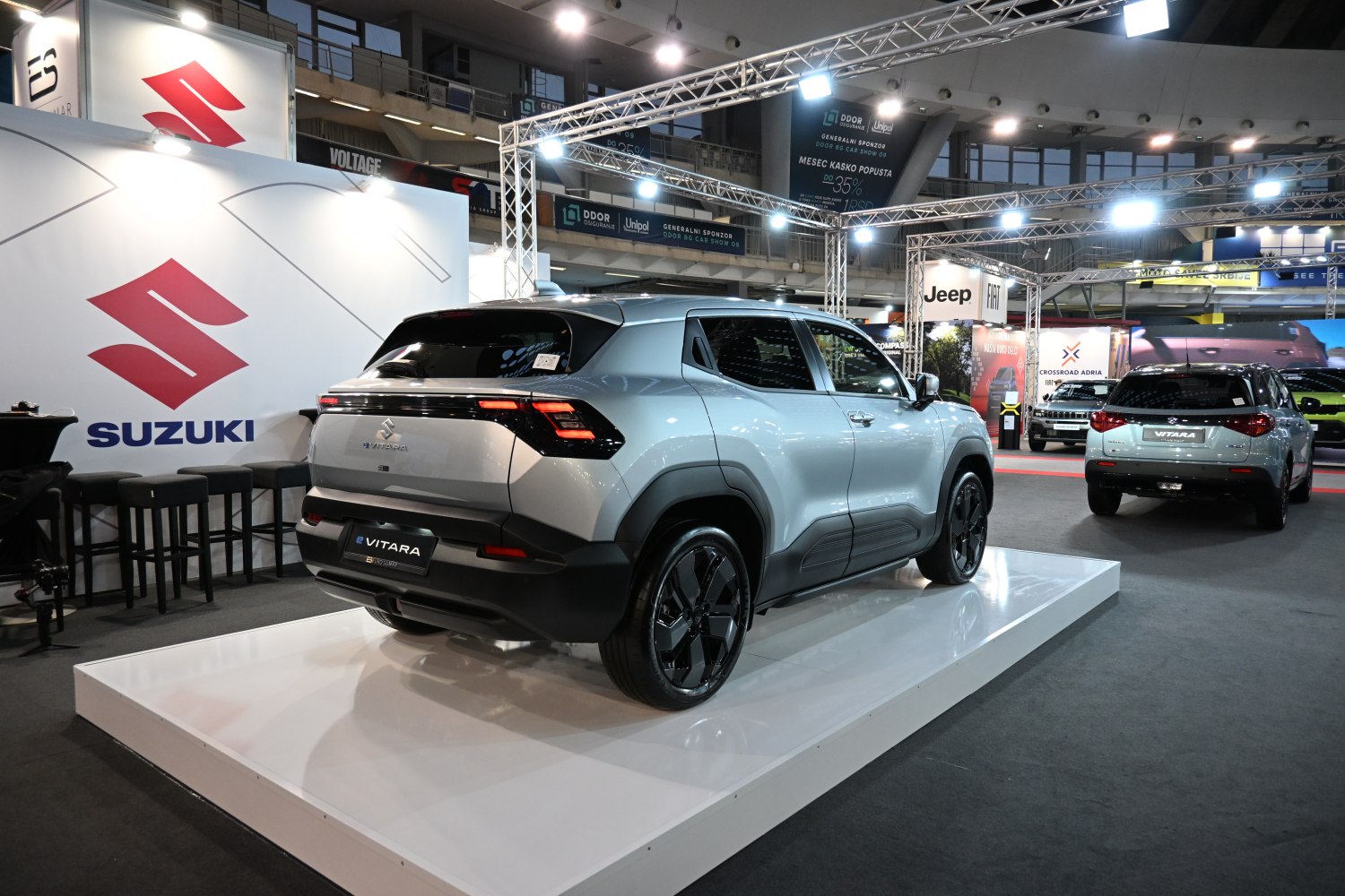 Rear view of modern SUV with black alloy wheels and LED taillights