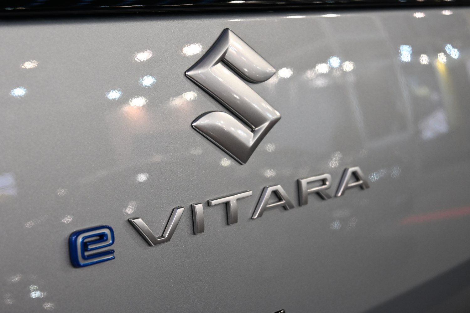 Close-up of Suzuki Vitara facelift rear emblem with e-Vitara badge